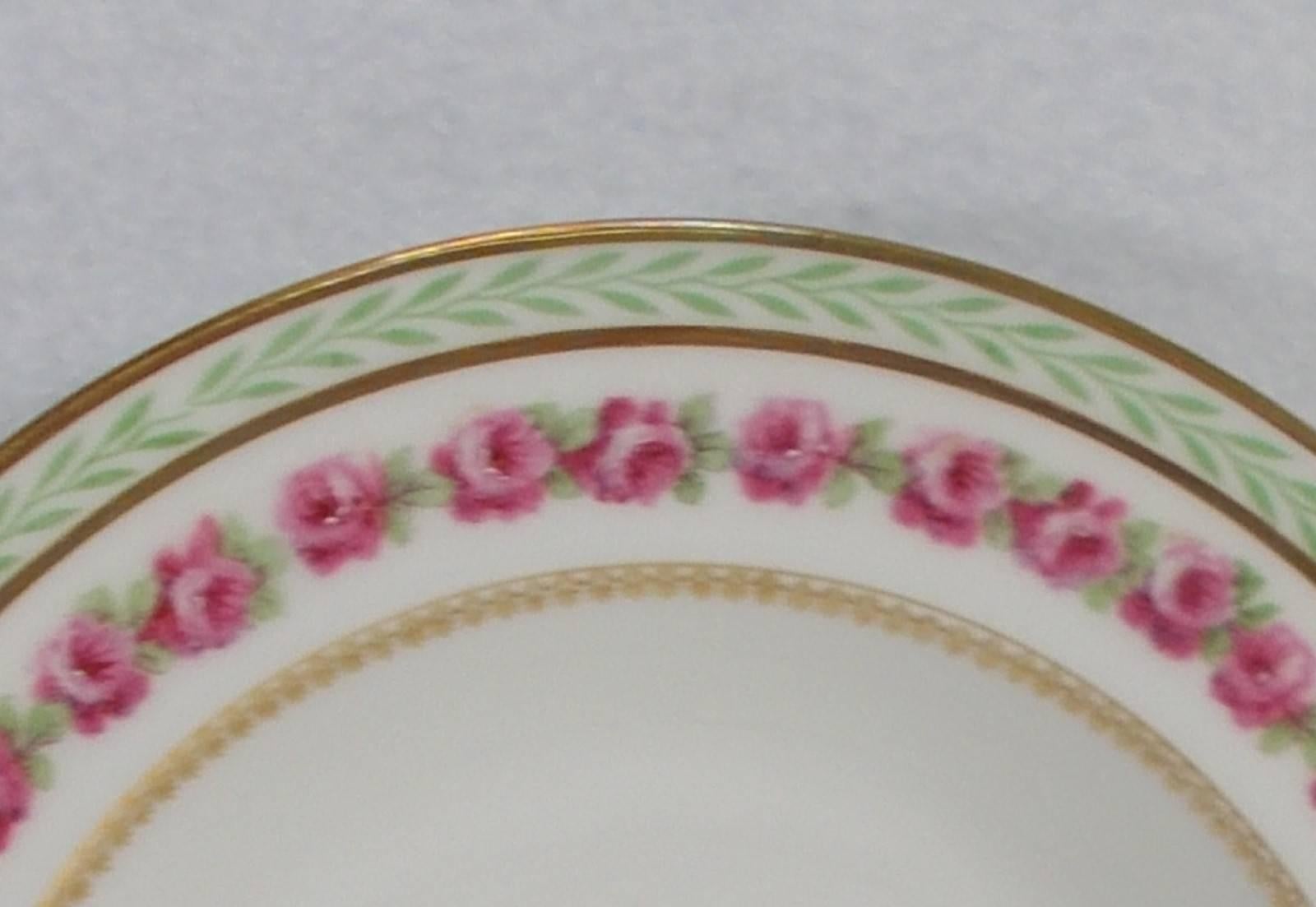 Bernardaud Limoges China BER274 pattern set of 12 soup/salad bowls.

In great condition free from chips, cracks, crazing, and/or stains, with only a minimum of use. 

Pink roses, green laurel. 

Gold bands and trim.

Measure: 8