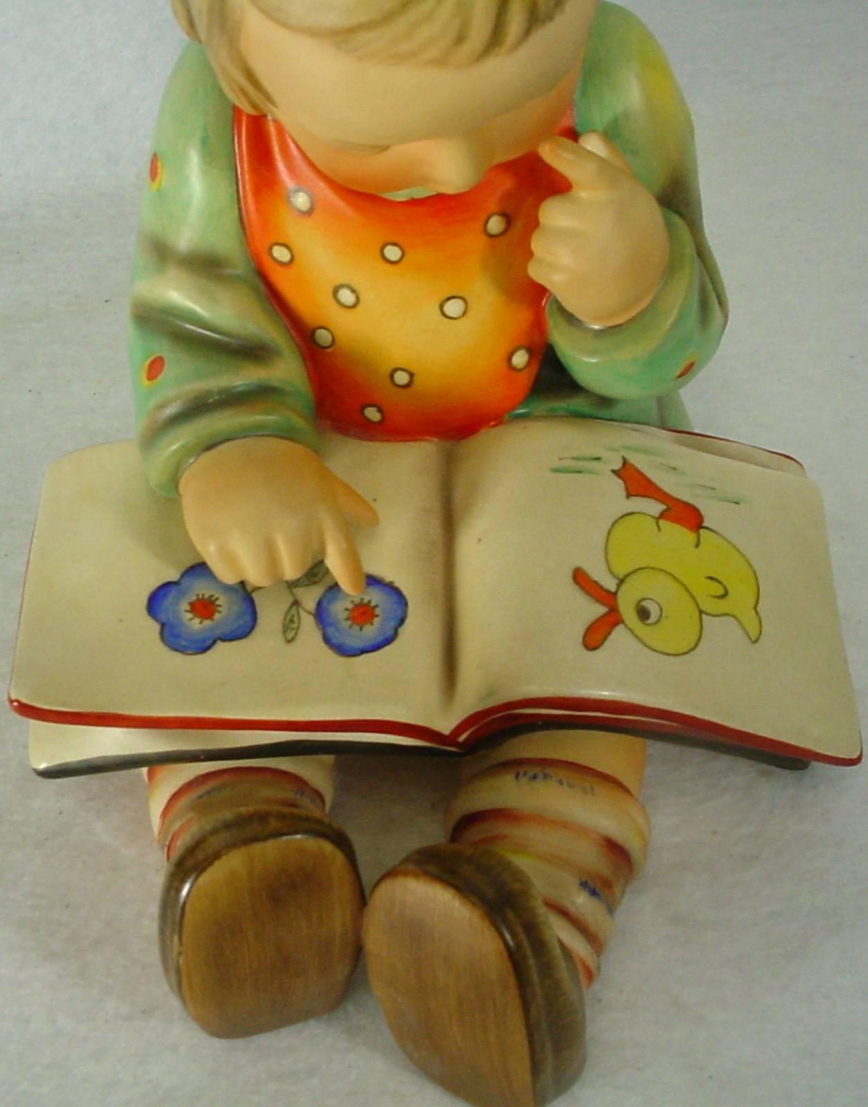 Hummel figurine book worm 3/III trademark 4

in great condition free-from chips, cracks, breaks, stains or discoloration and with only a minimum of use. 

Production dates: Unknown. 

Measures: 8