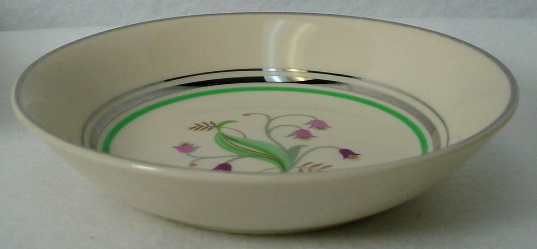 In great condition with minimal use.

Production dates: 1949-1967.

Includes 21 cup, 16 saucer, 12 dinner plate, one dinner plate large, 14 salad plate four bread plate, 12 fruit or berry bowl, and 12 soup or salad bowl.

Federal
