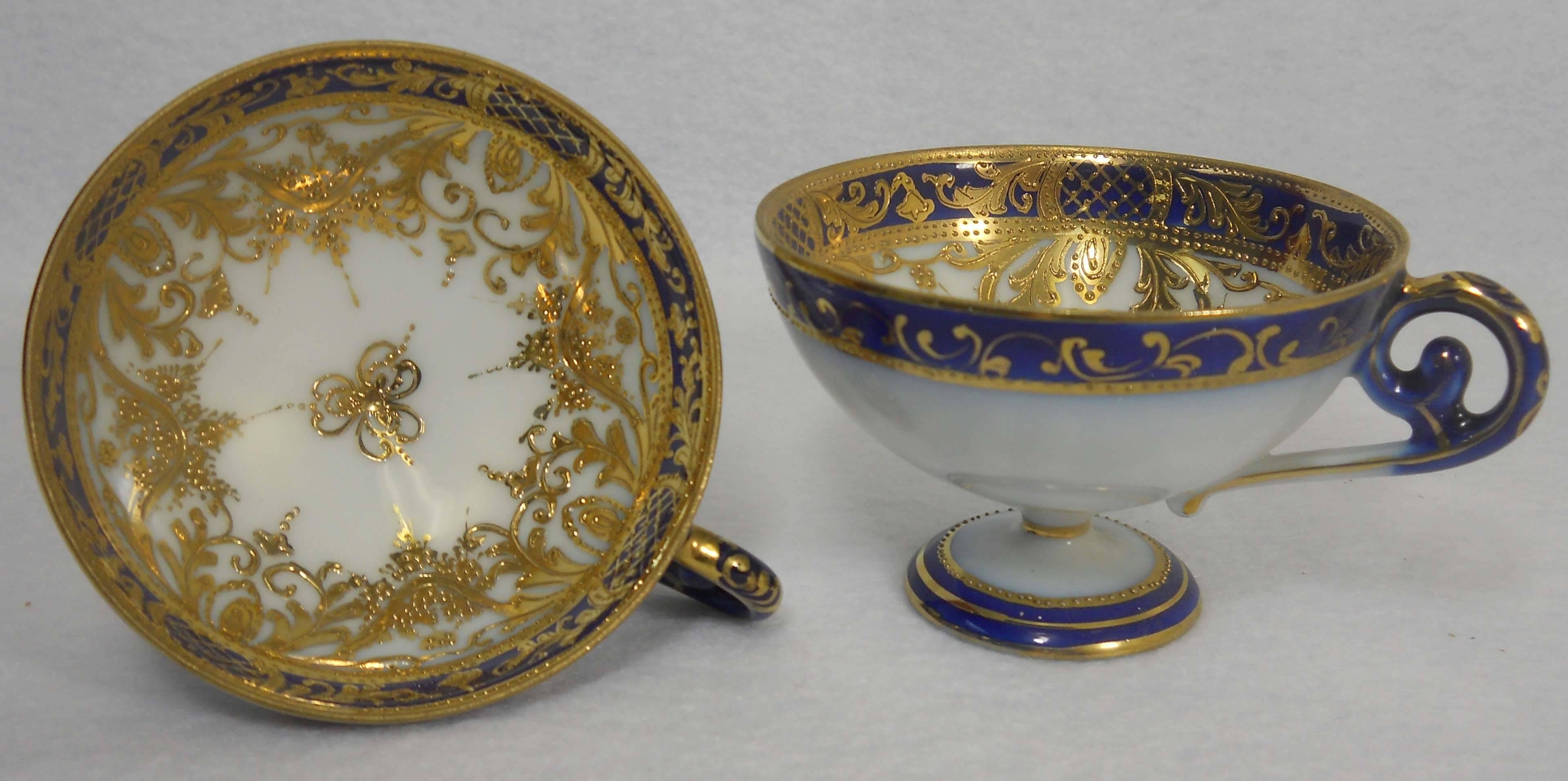Hand-painted, hand gilded and gilt encrusted tea service, circa 1890s, produced by the Noritake China company. Beautiful condition, set consists of a teapot, creamer, sugar bowl, and six cup and saucer sets.