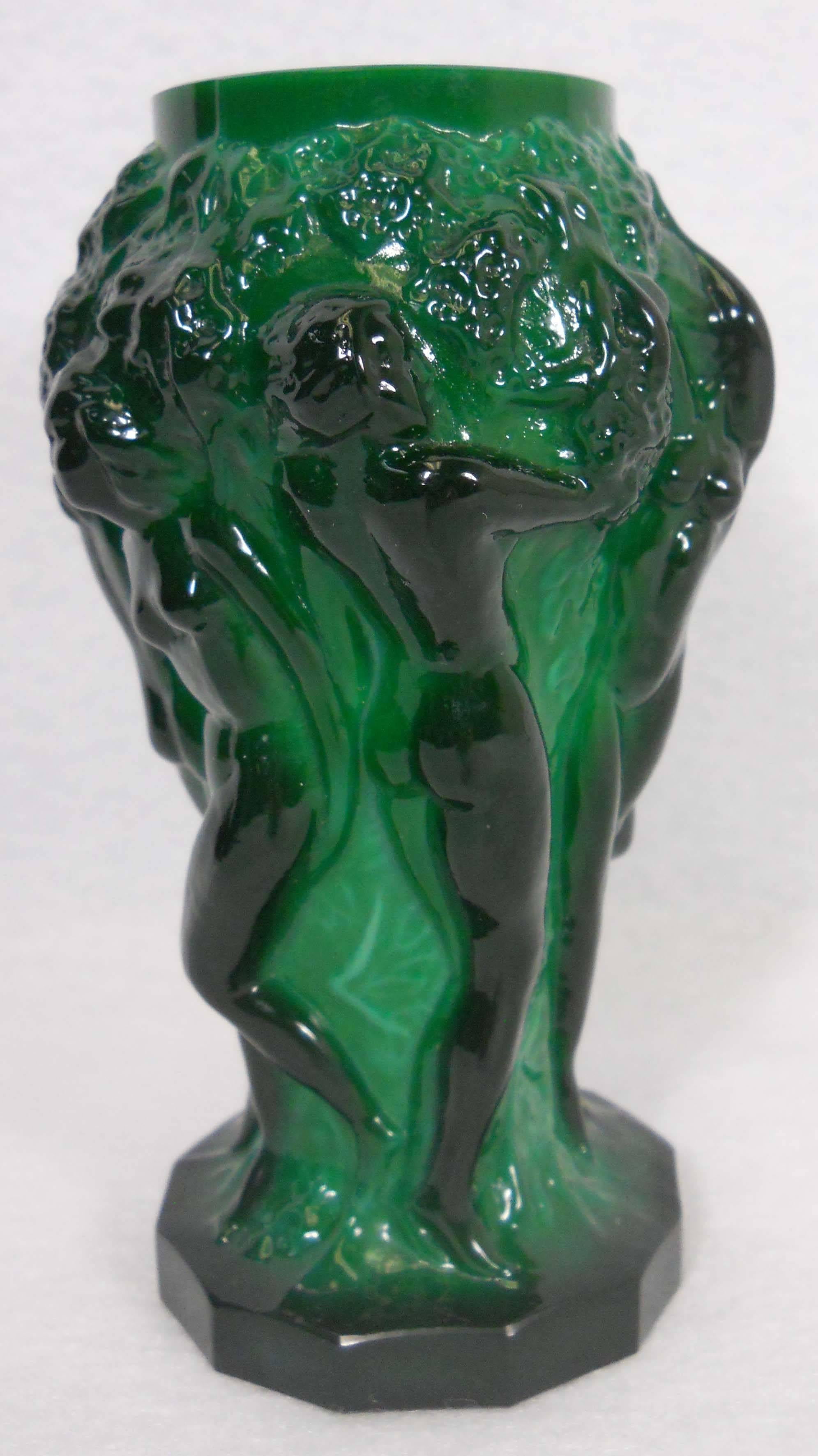 Beautiful Art Deco malachite glass vase with females and grapes in relief are near the perfection. Made by Riedel Glass for Schlevogt's 1930's INGRID line. Henry Schlevogt took over his father in law H. Hoffman and worked for several years to