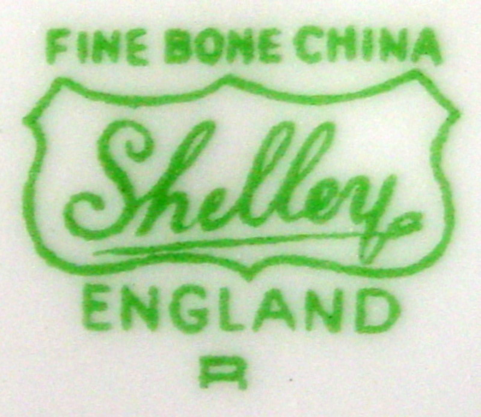 British Exquisite Toy Size Cup and Saucer Set in the Charm Pattern