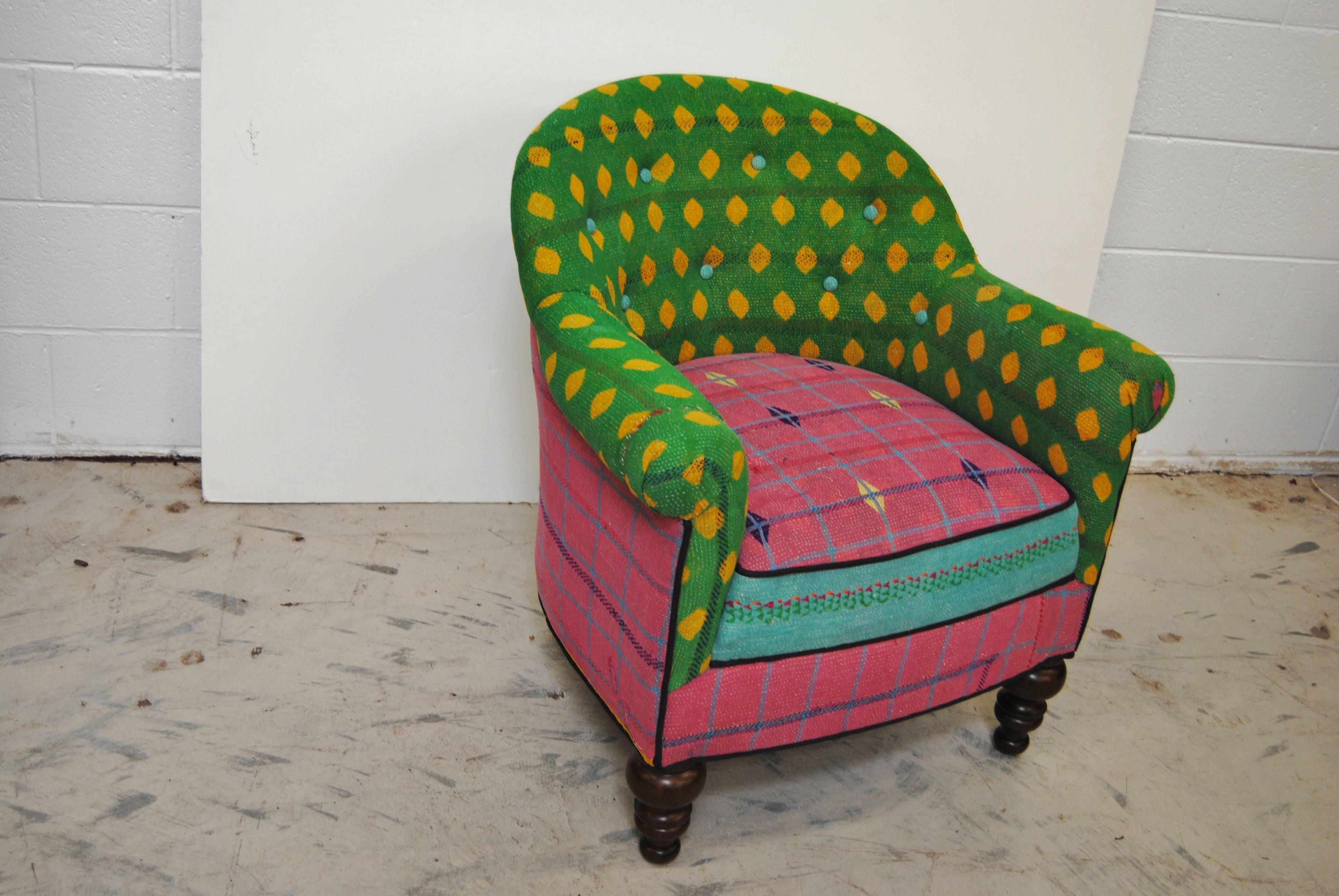Vintage French small scale club chair newly upholstered in an assortment of vintage kantha quilts from India. Four to five layers of vibrant colored vintage cotton saris are pieced and hand quilted with tiny stitches. The chair has been restored and