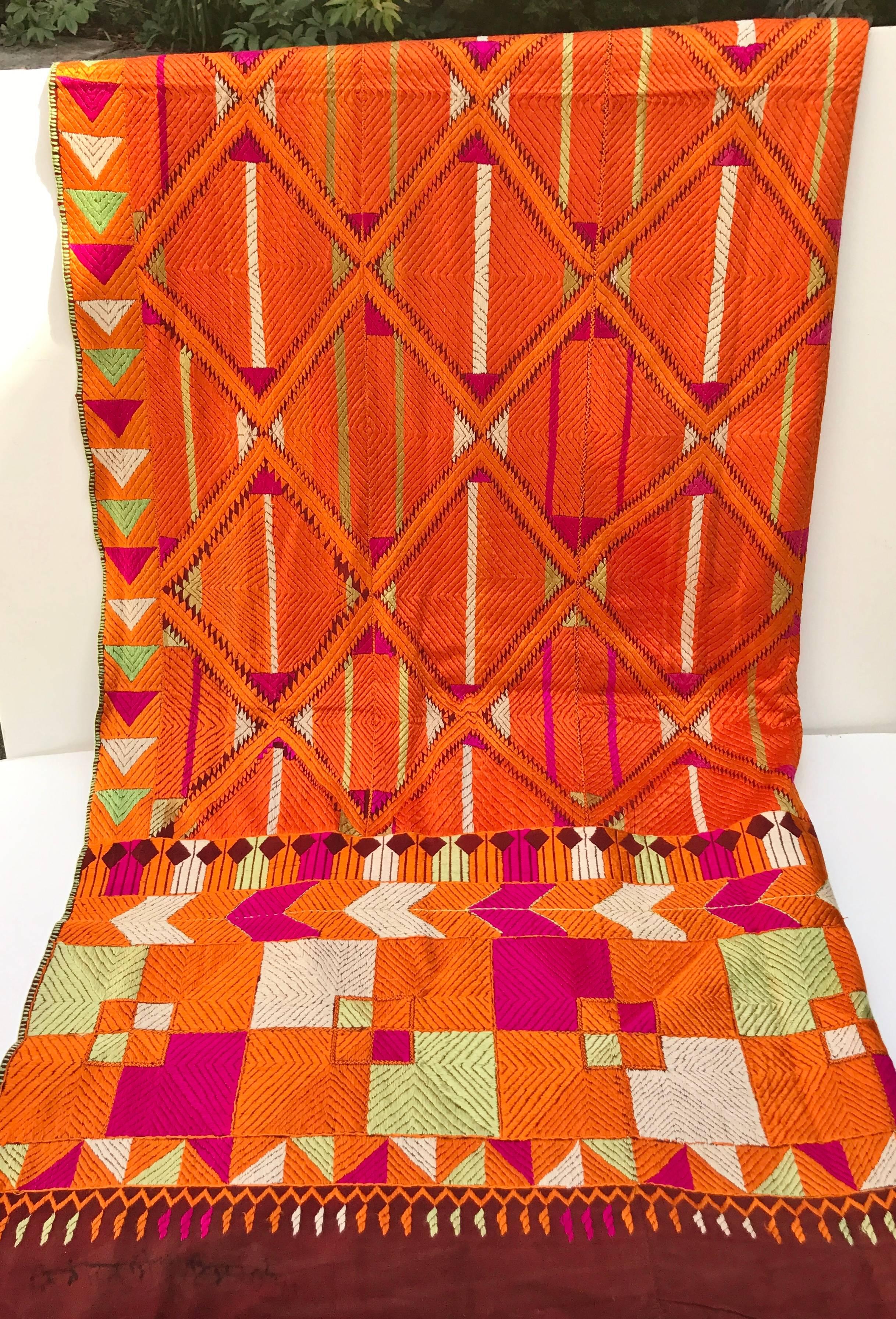 Vintage Phulkari Bagh wedding shawl from Punjab, India. The hand loomed cotton khadi cloth is hand embroidered with vibrant silk threads by members of the young girl's family for her wedding. A lost art, one of a kind, wedding gift, folk art,