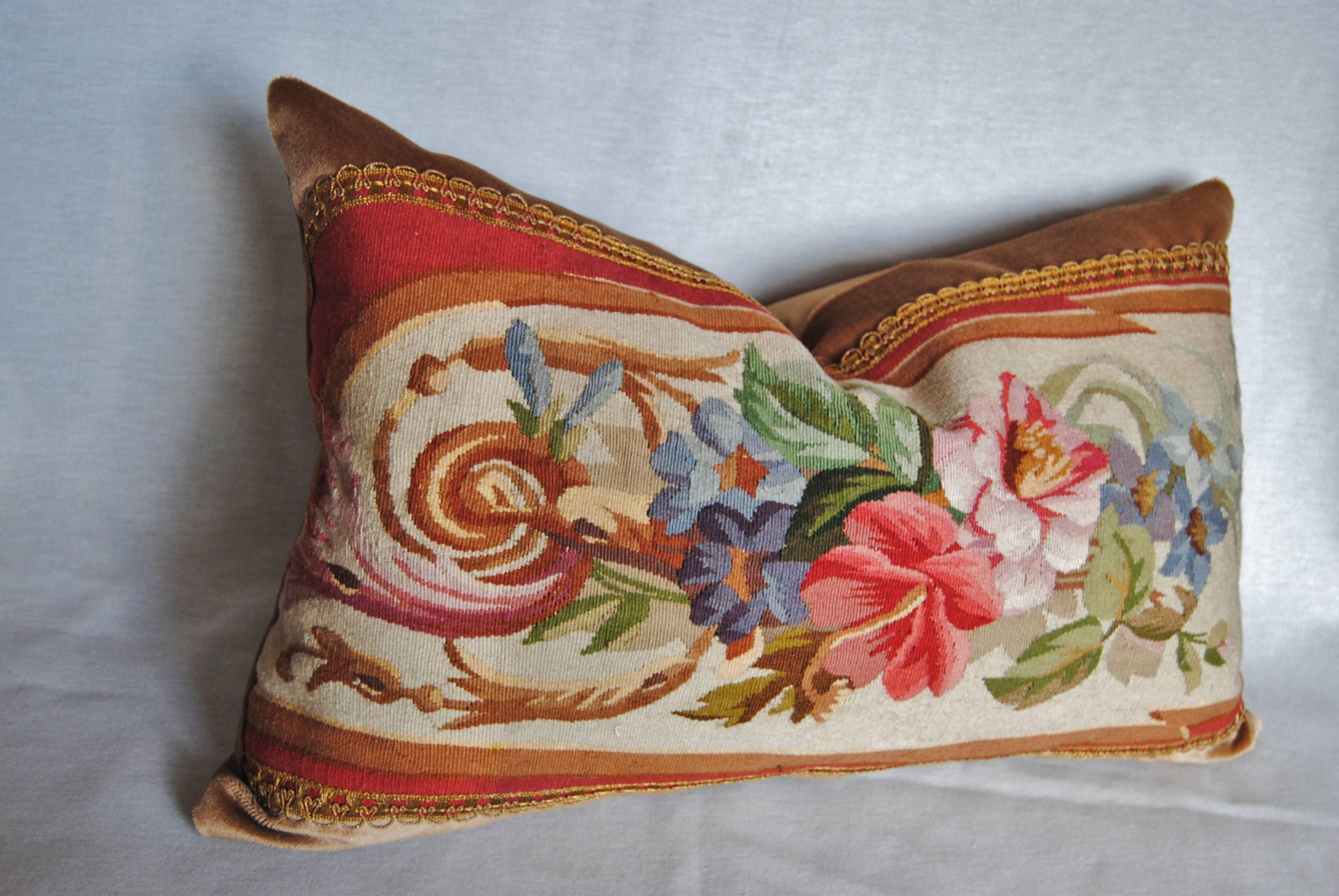 Custom pillow cut from an antique French Portiere from the mid to late 19th century. Color is strong and detail is spectacular. The tapestry is mounted on mohair and edged with an antique gilt trim. The pillow is backed in silk, filled with an