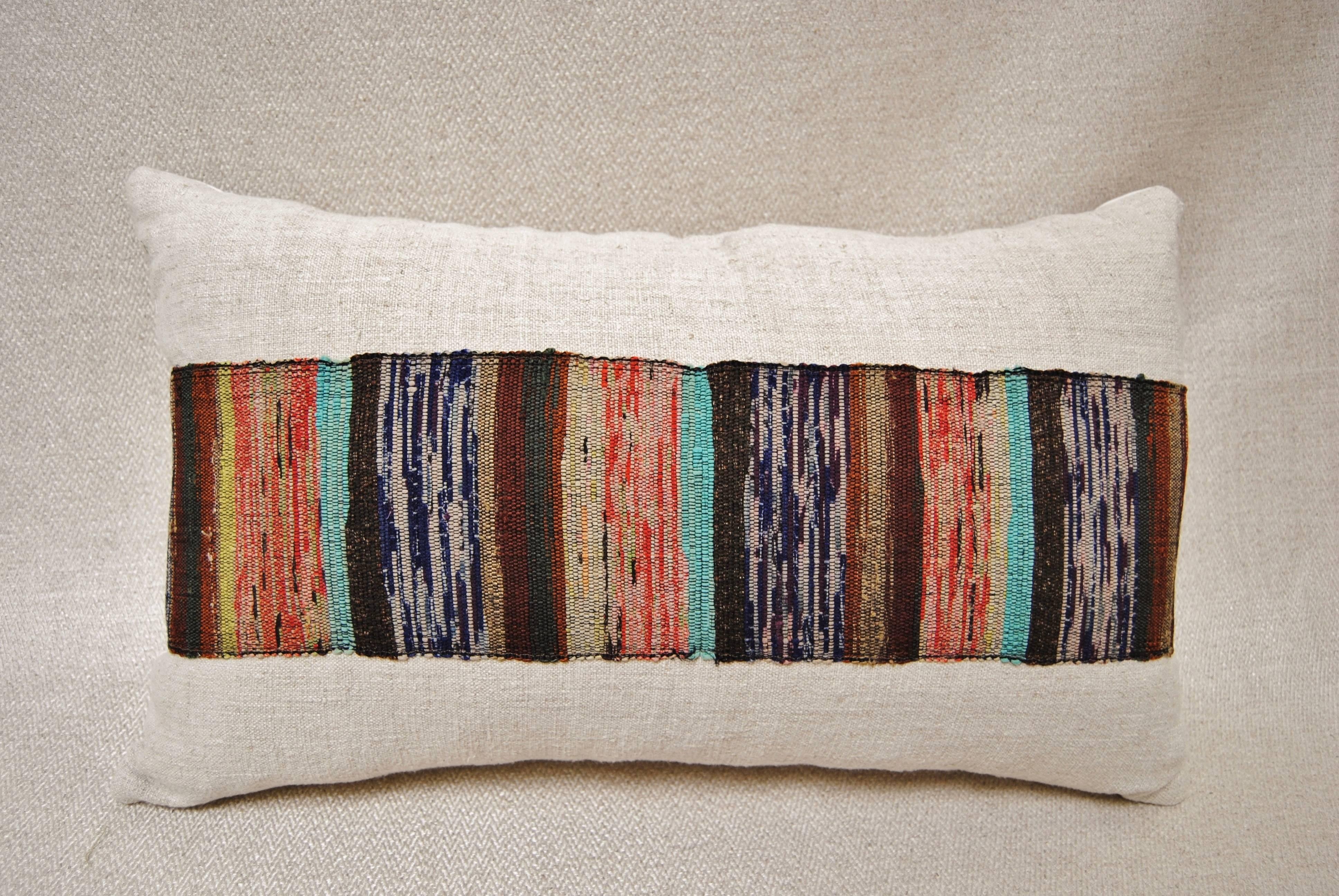 Custom pillow cut from a vintage Japanese hand loomed sakiori obi. Sakiori is the Japanese technique of fine rag weaving. Remnants of silk and assorted textiles are cut into thin strips and rewoven into obis. This vintage obi is backed by hand