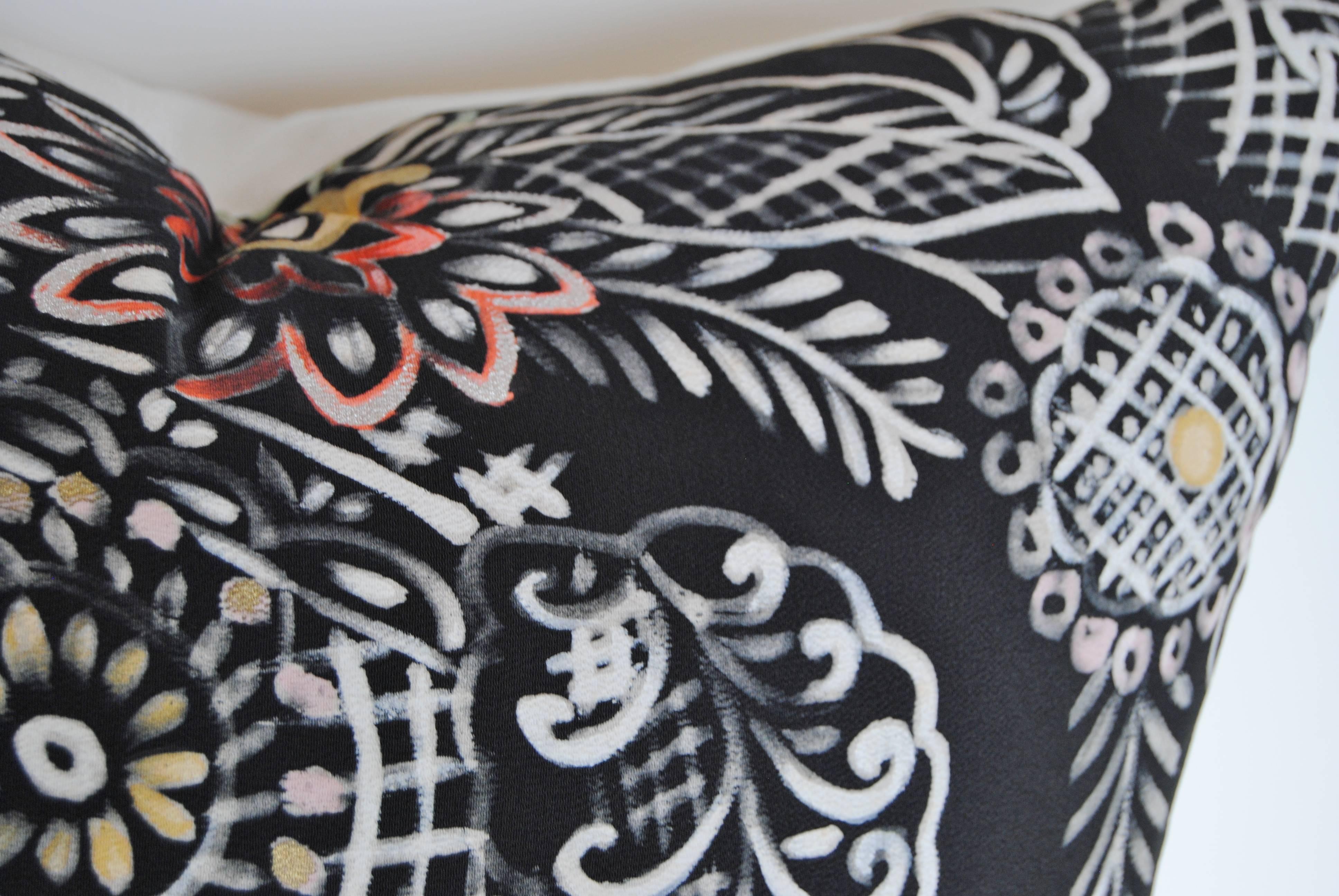 Custom pillow cut from a vintage hand-painted black silk Japanese kimono. The black and white textile design is accented with touches of metallic color. Pillow is backed in white linen, filled with an insert of 50/50 down and feathers and hand-sewn