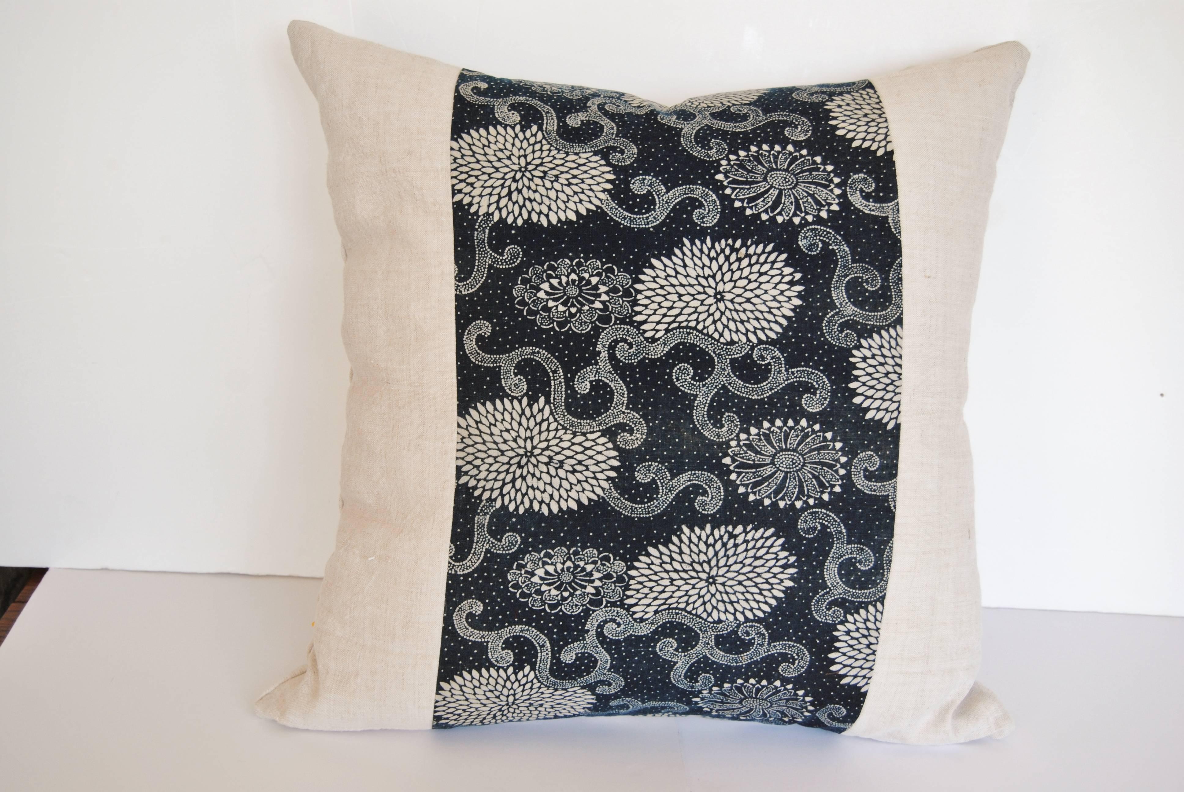 Custom pillows cut from an antique hand loomed Japanese indigo katazome [stencil resist dyeing] cotton textile. The indigo textile fragment is faced and backed with a hand loomed off white French antique linen. The pillows are filled with an insert