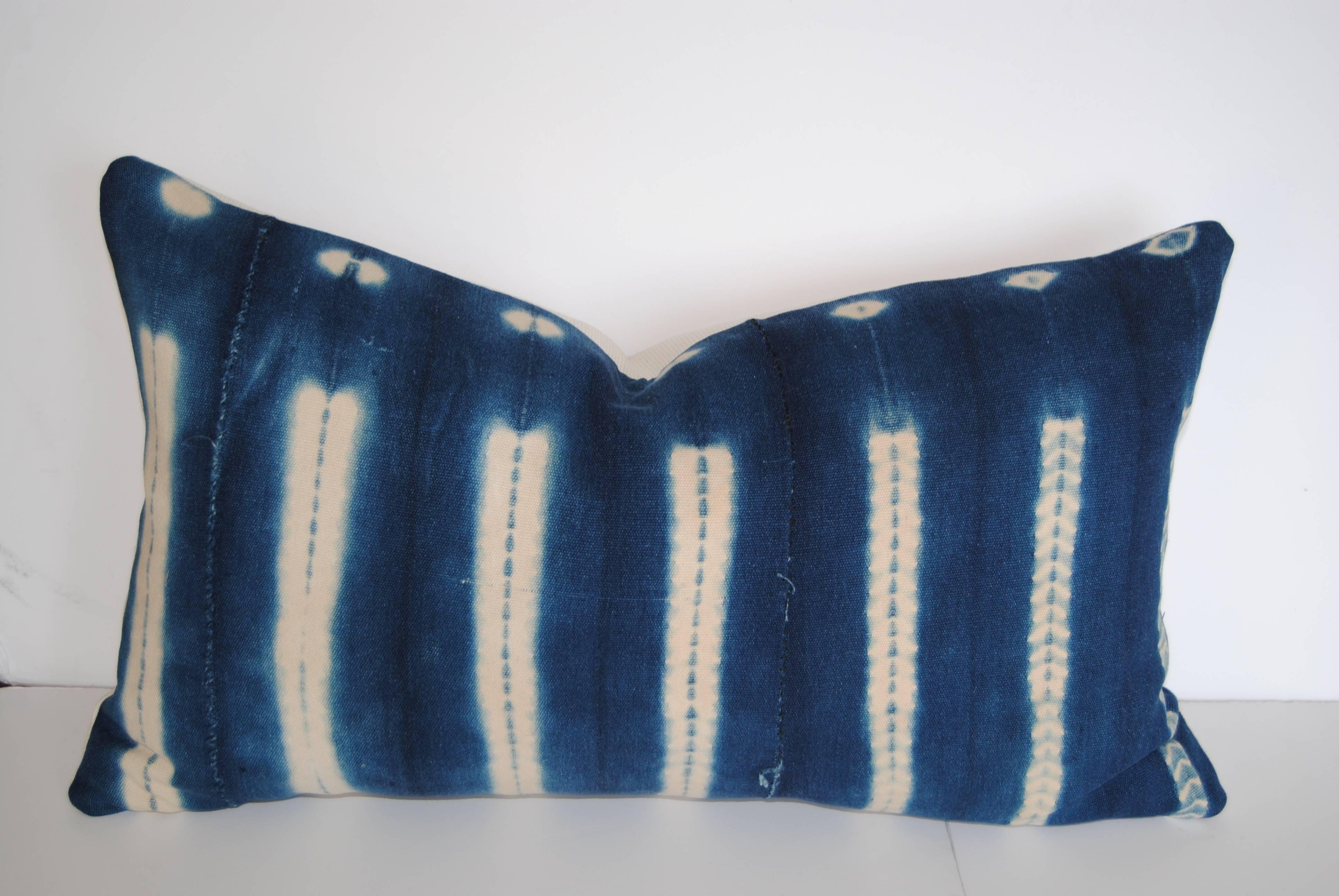 Custom pair of pillows cut from vintage African Indigo hand-loomed textiles. From Mali. The textile is woven in 10