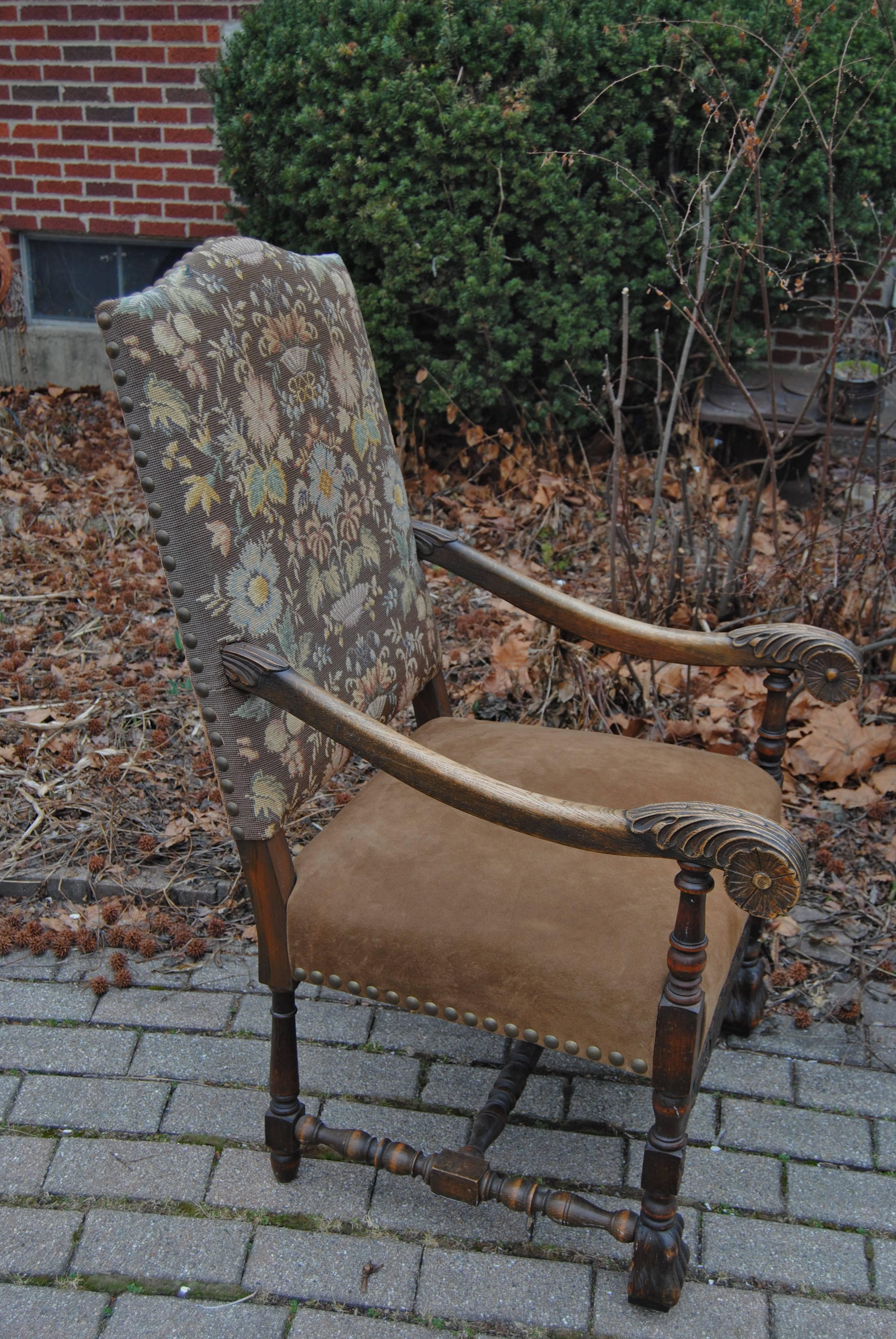 Antique European armchair with original needlepoint back. Seat newly reupholstered in Edelman suede leather. Back of chair in original antique velvet with nailheads. Hand-carved wood has original finish.