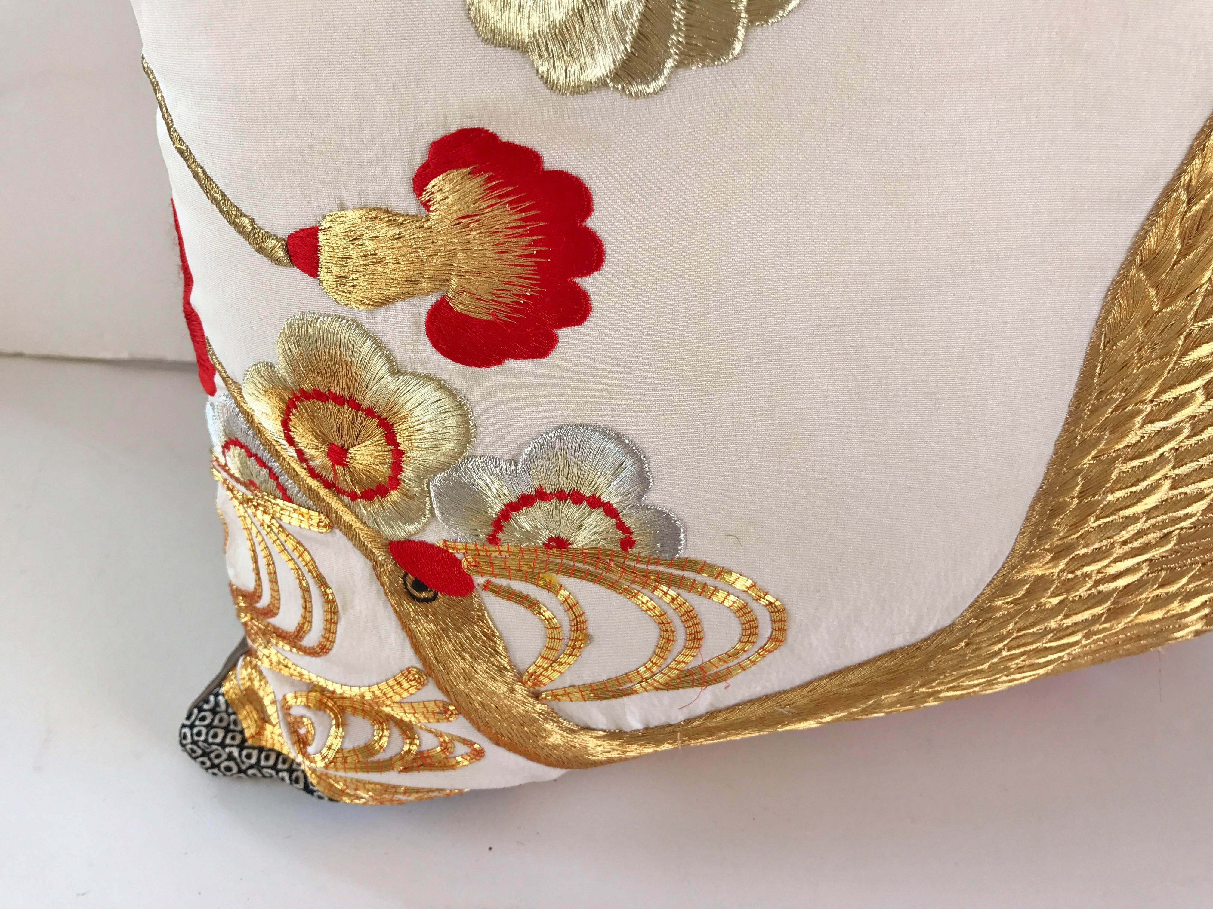 Custom pillow cut from a vintage Japanese silk Uchikake, the traditional wedding kimono. Silk is embroidered with metallic and silk threads in traditional Japanese designs. Pillow is backed in silk, filled with an insert of 100% down and hand-sewn