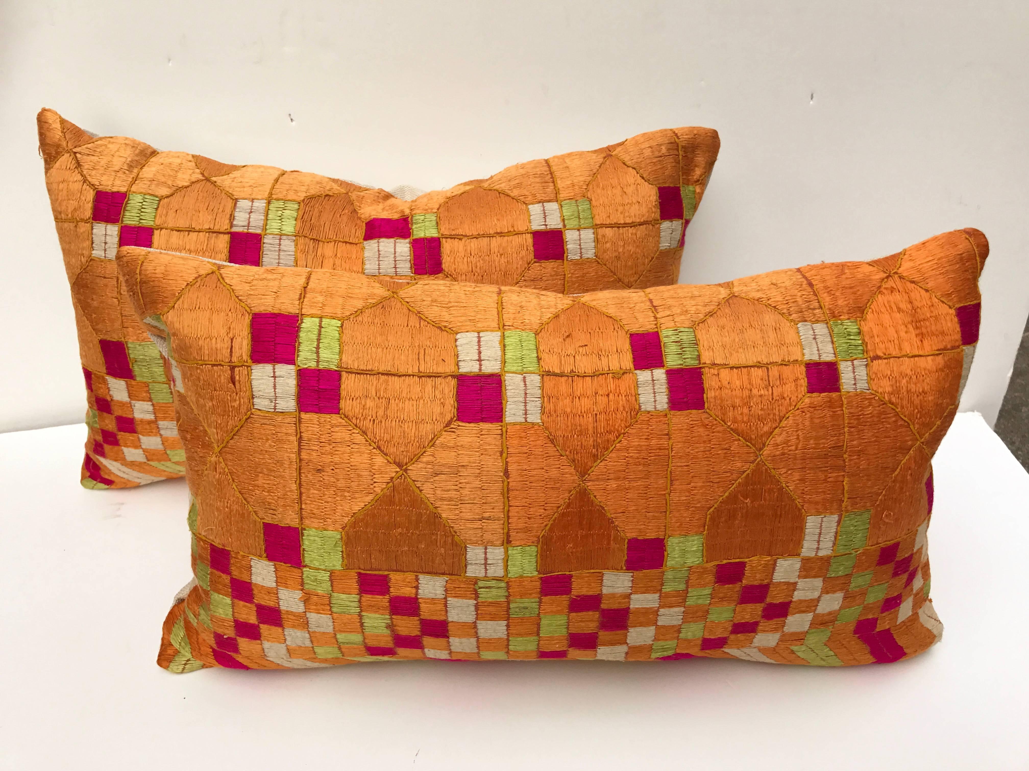 Custom pair of silk embroidered pillows made from a vintage Phulkari Bagh wedding shawl from Punjab, India. Pillows are backed in an off-white silk, filled with an insert of 50/50 down and feathers and hand-sewn closed. Priced as a pair.