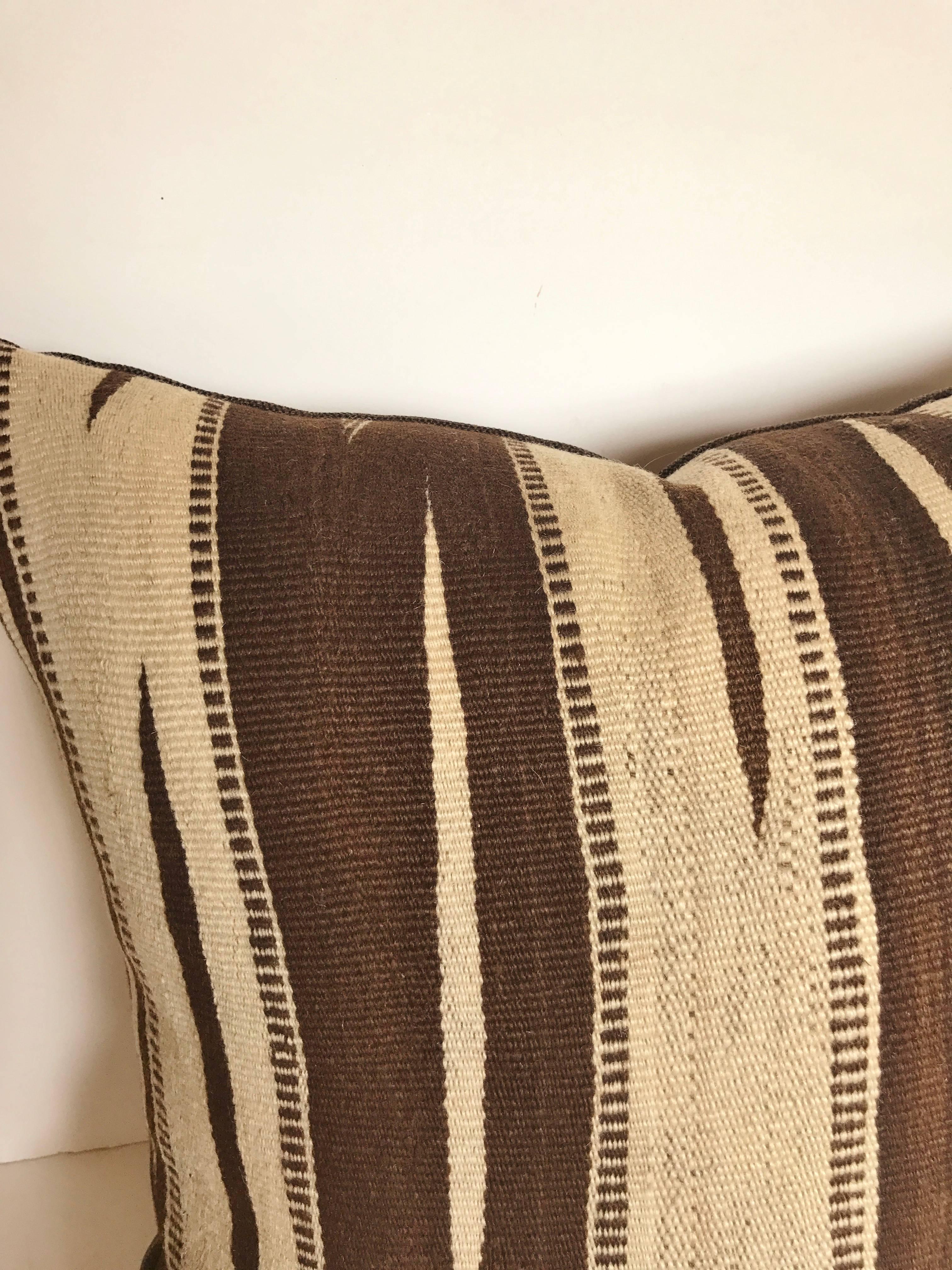 Hand-Woven Custom Moroccan Pillow Cut from a Vintage Hand Loomed Wool Ourika Kilim For Sale