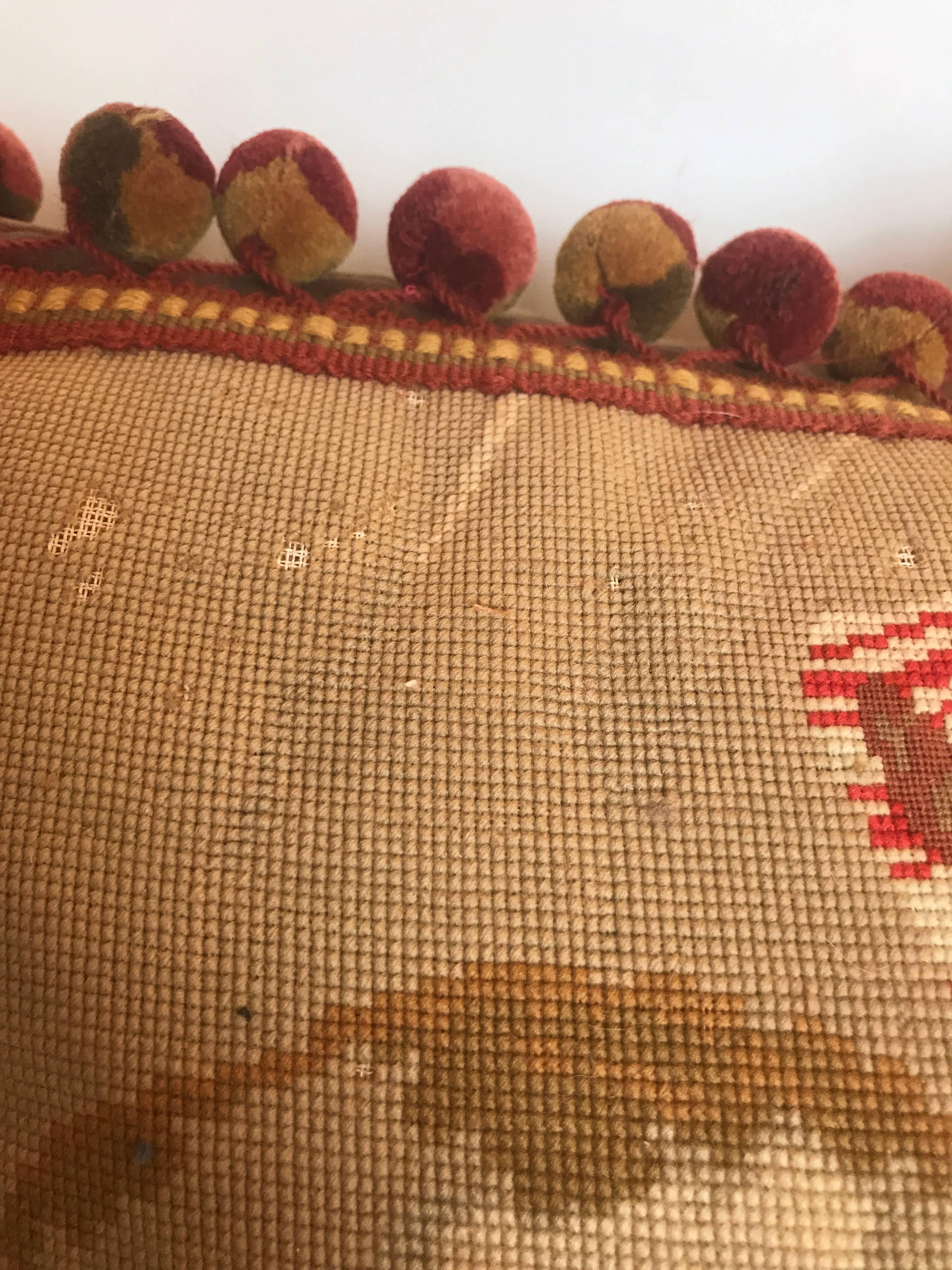 Antique European Needlepoint Pillow with Designer Wool Ball Fringe In Good Condition For Sale In Glen Ellyn, IL