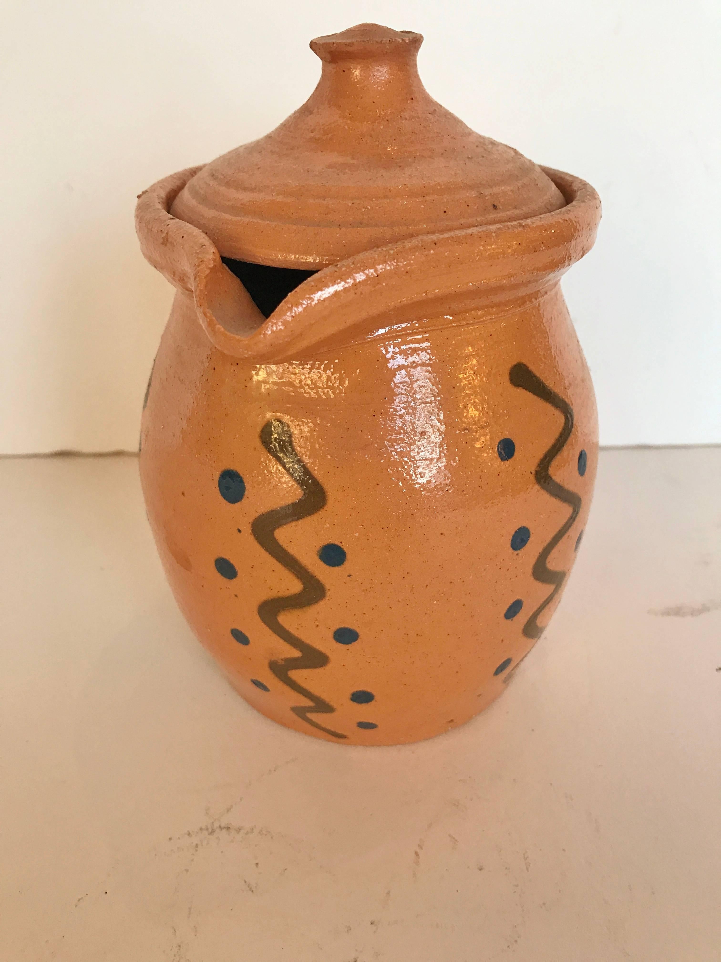 Vintage French Alsace pottery, pitcher with lid. Mustard color embellished with typical Alsace design of zig zags and dots. Very good condition, probably never used. French Folk Art.