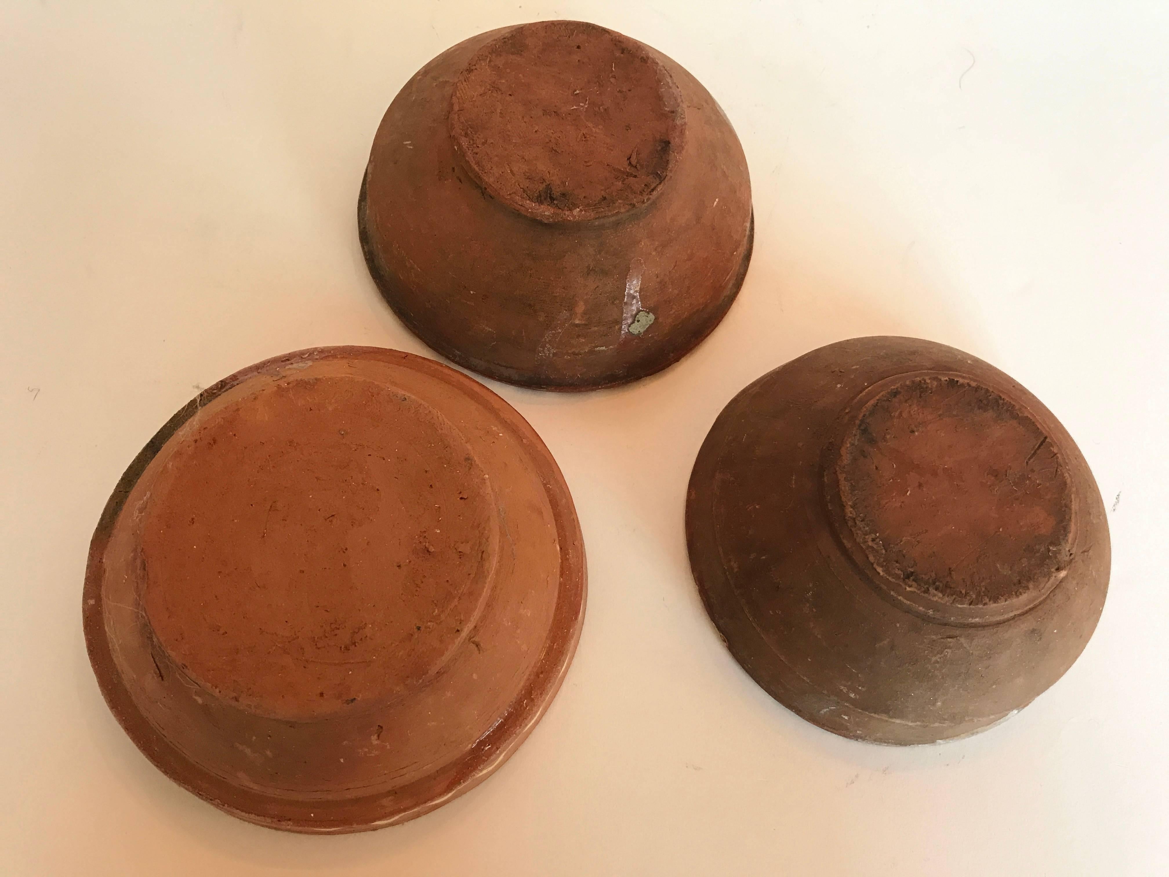 Vintage splatter painted glaze redware terra-cotta pottery bowls from Transylvania, Romania.  Each piece is hand made and slightly different in size and design.  Width, 6.5
