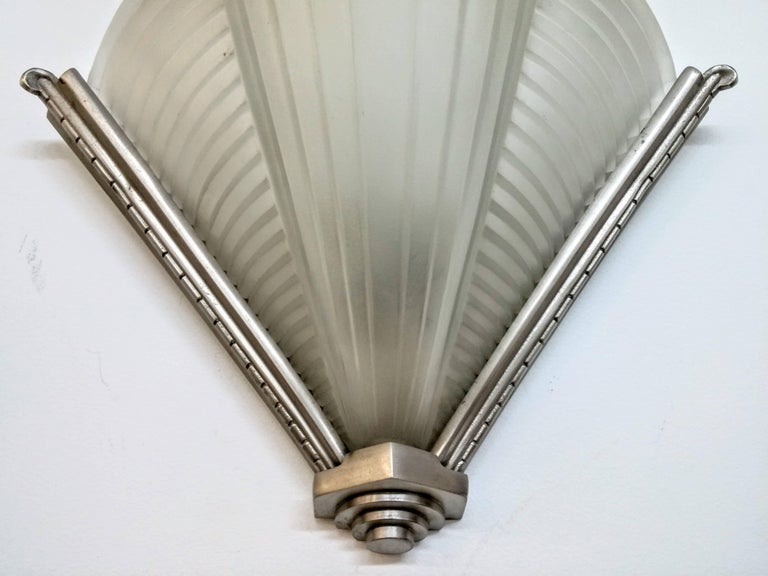 20th Century Pair of French Art Deco Wall Sconces by Petitot For Sale