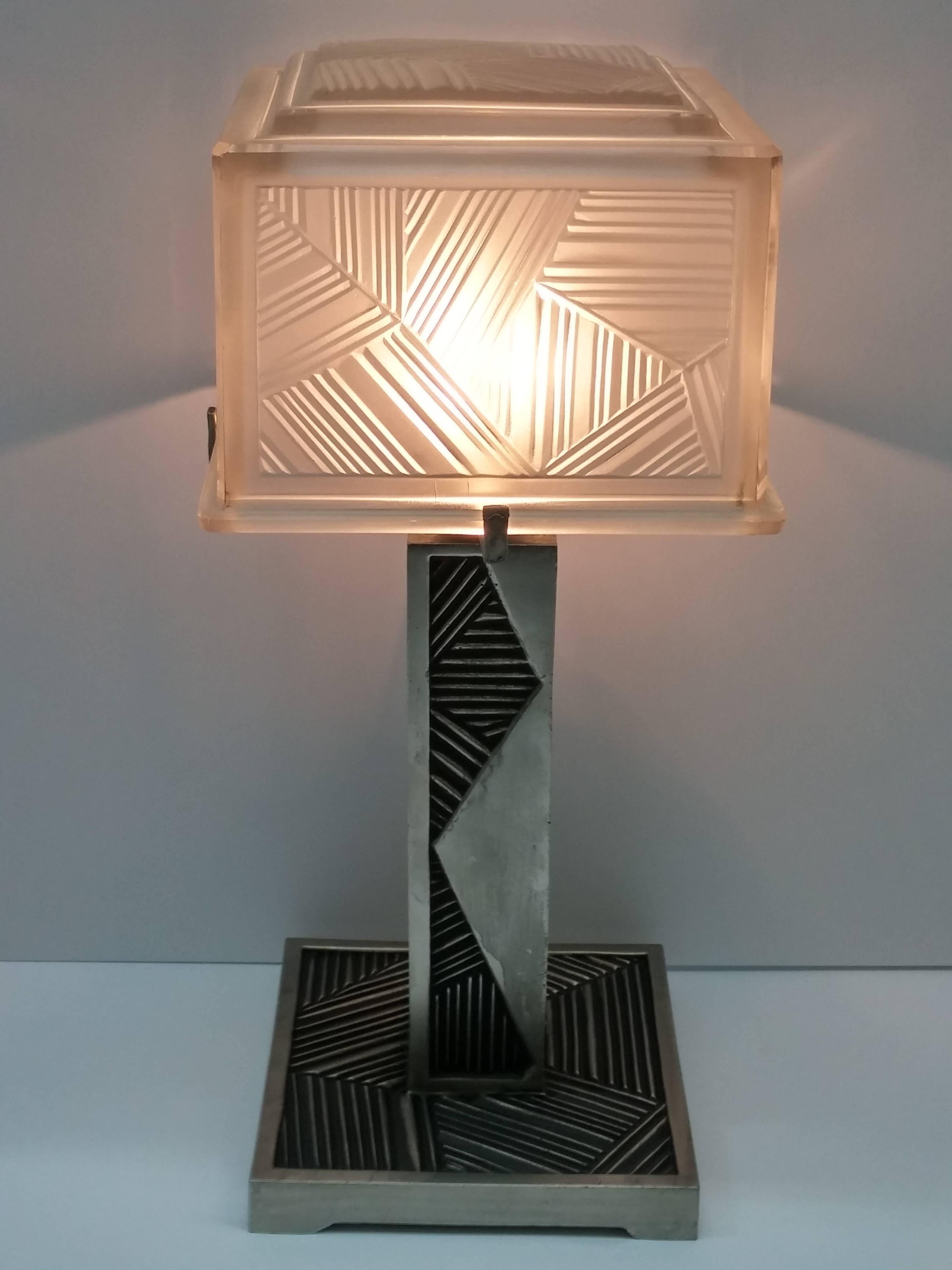 
A stunning French Art Deco square shaped table lamp created in the 1930s by 
