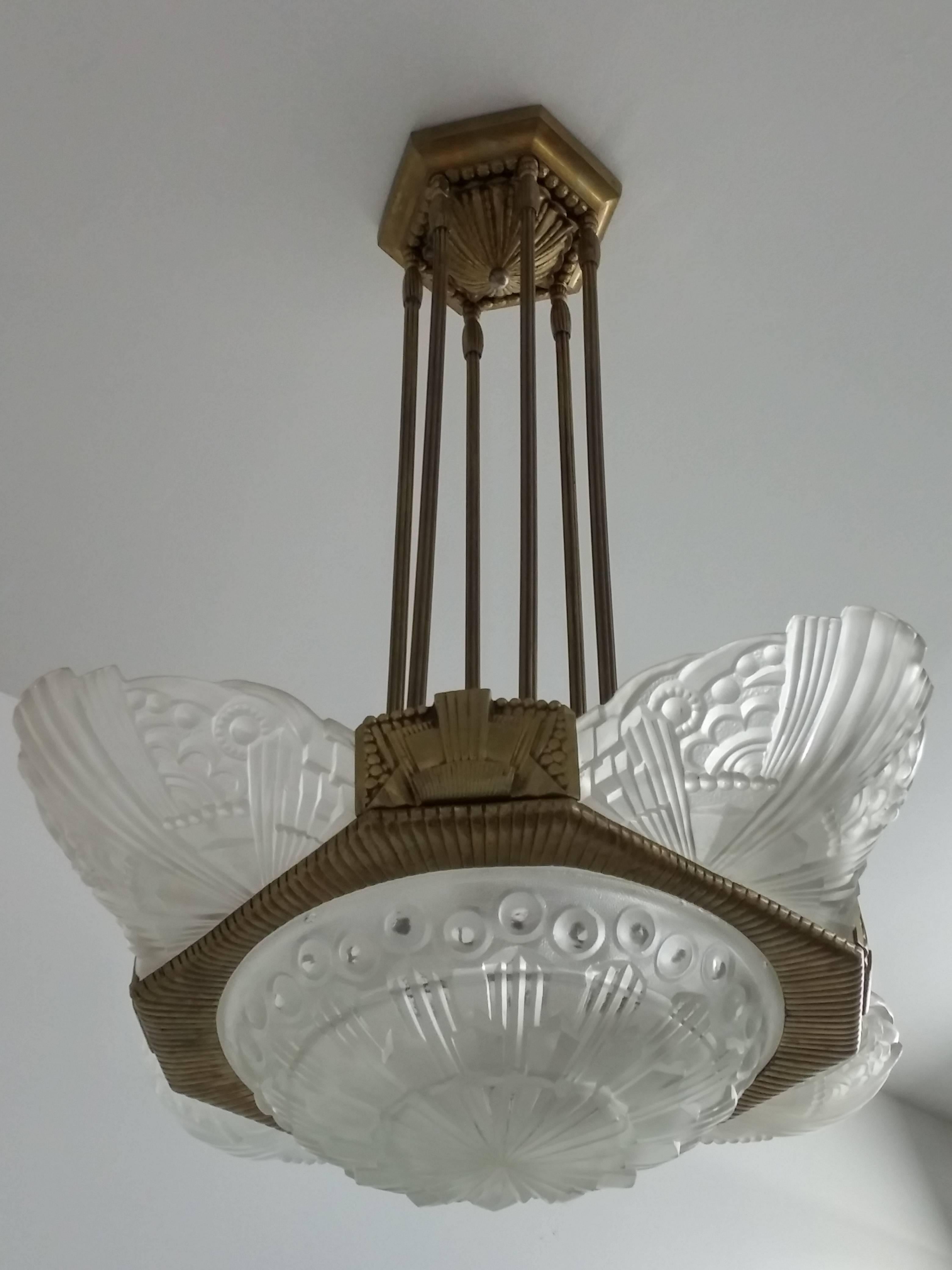 This outstanding French Art Deco chandelier was designed by 