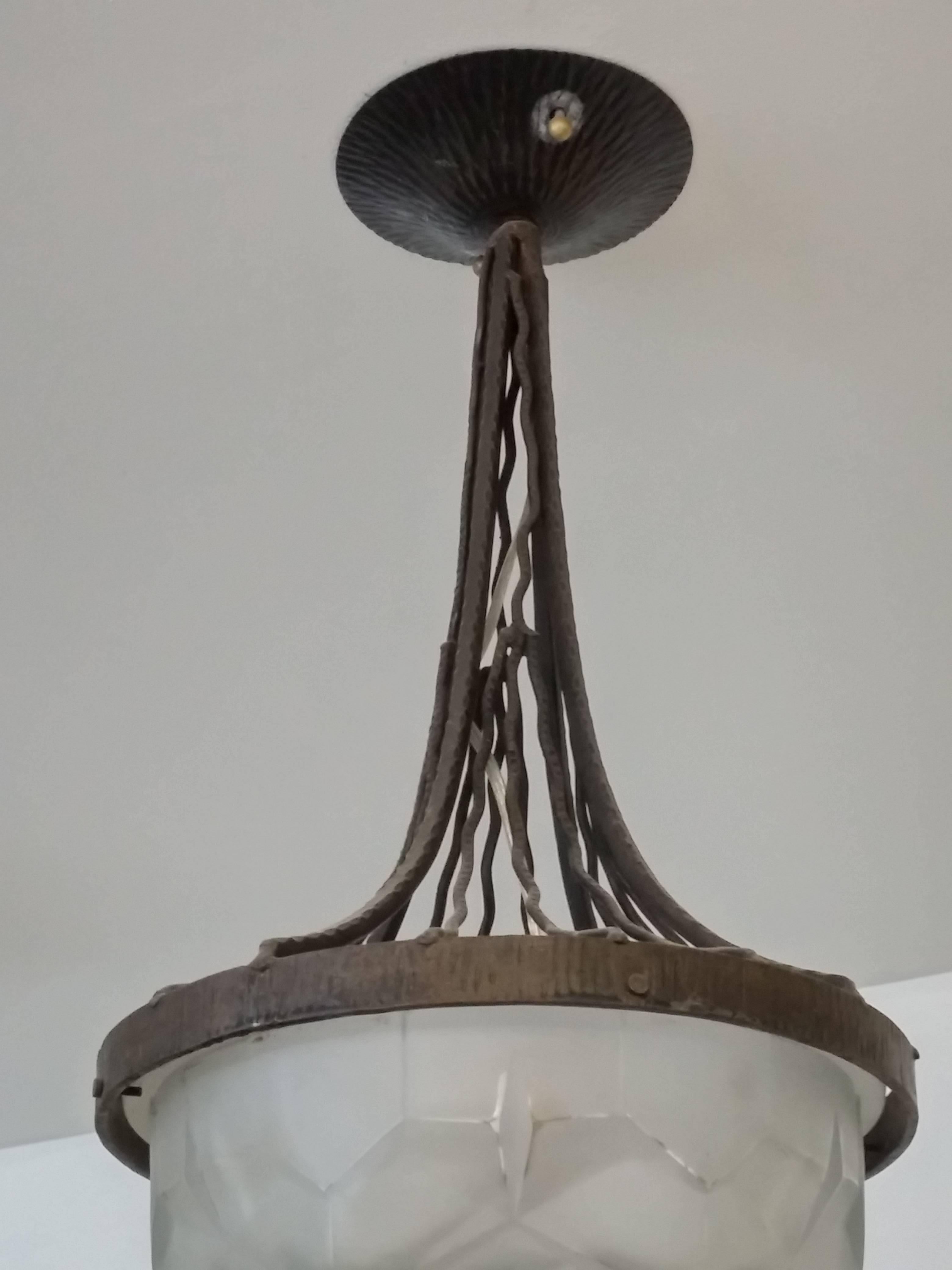 French Art Deco wrought iron pendant chandelier designed by the French Artist 