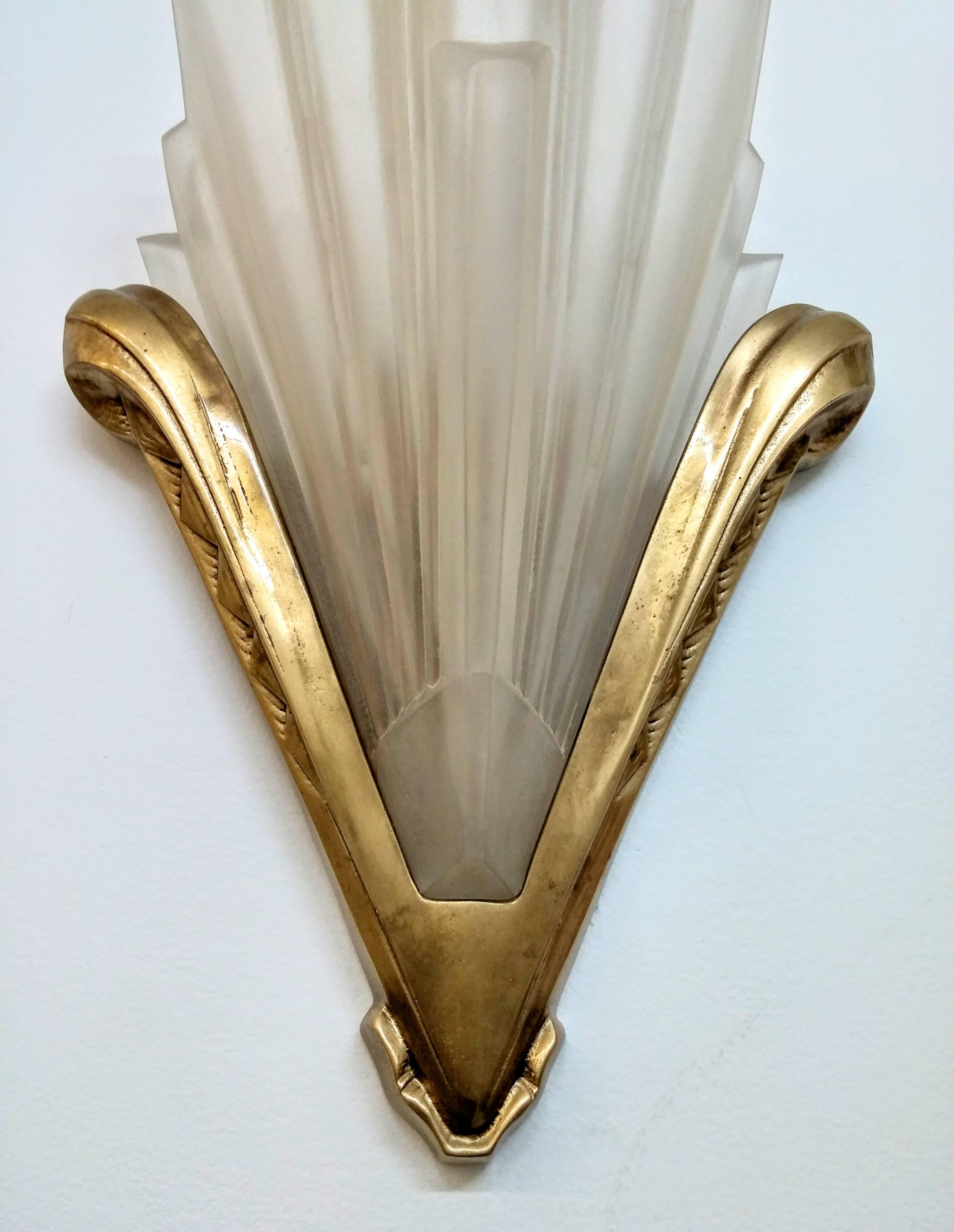 Cast French Art Deco Wall Sconces signed by Sabino