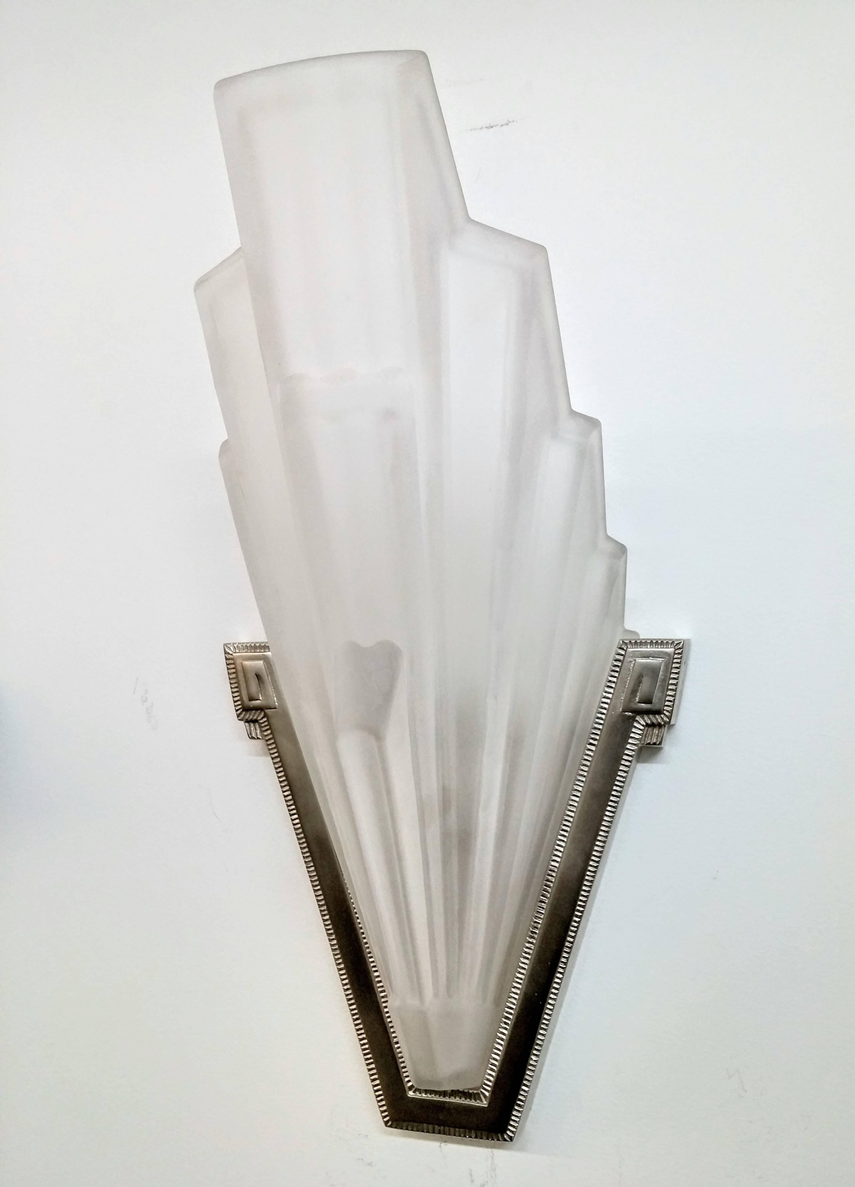 Cast French Art Deco Wall Sconces by Hanots