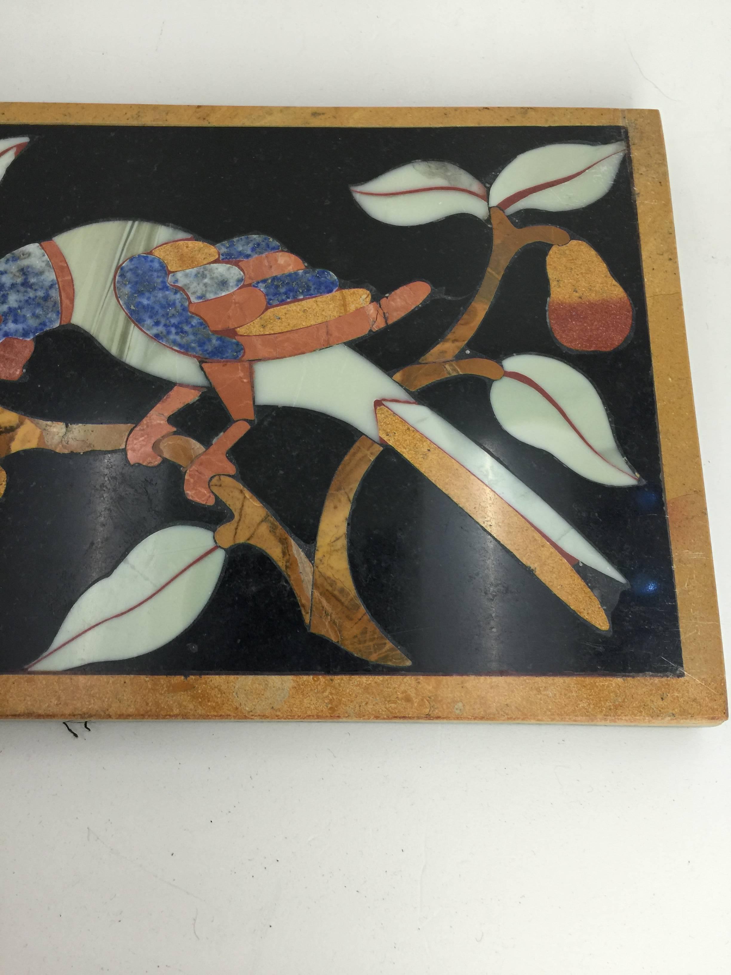 The Pietre Dure panel inset with lapis lazuli, marmo giallo, in a rectangular shape, probably a panel from a cabinet.