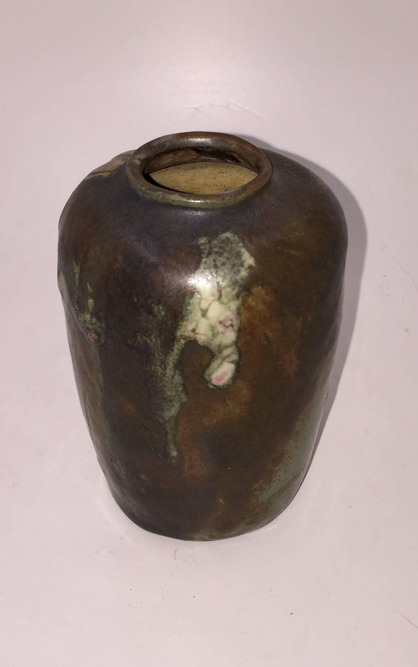 The small vase with incised mark on bottom.