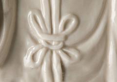 Pair of Chinese Blanc de Chine Porcelain Figures of Guanyin Songzi