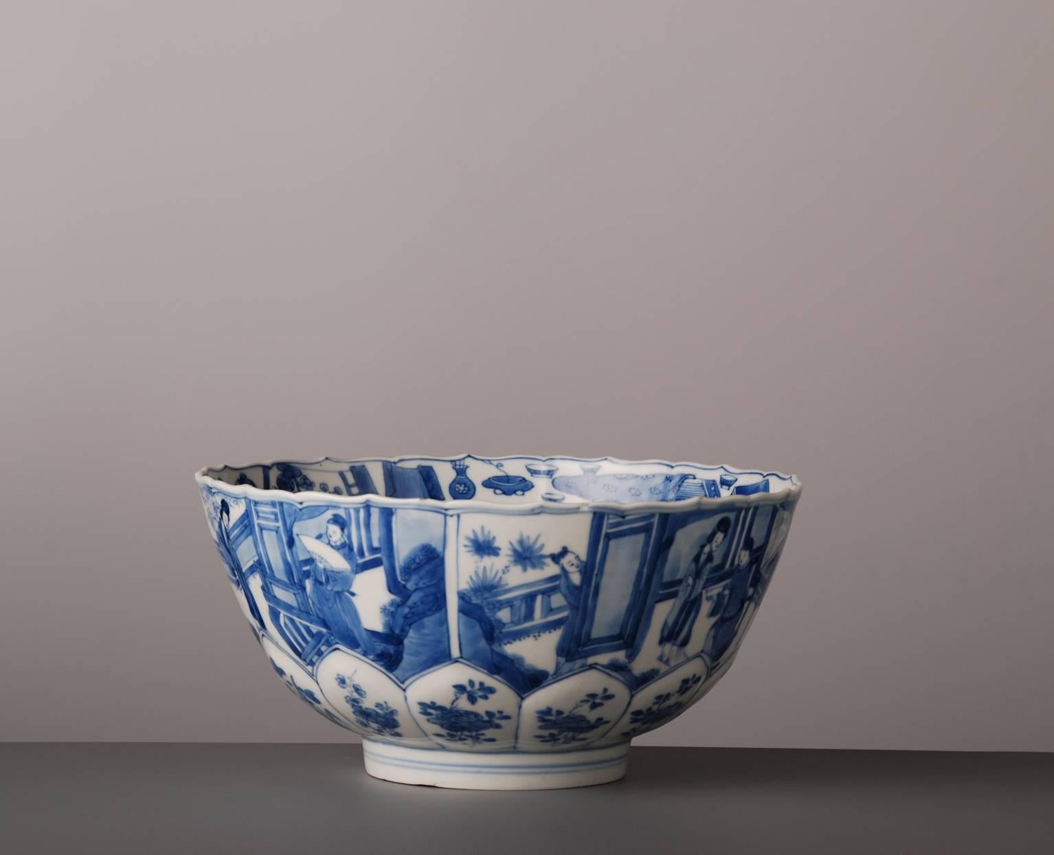 This bowl is potted on a turning wheel to create the round form, afterwards the round clay bowl was pressed in a mould to create the lotus flower form on the lower side of the bowl. Than the ‘naked’ bowl would have been decorated with cobalt