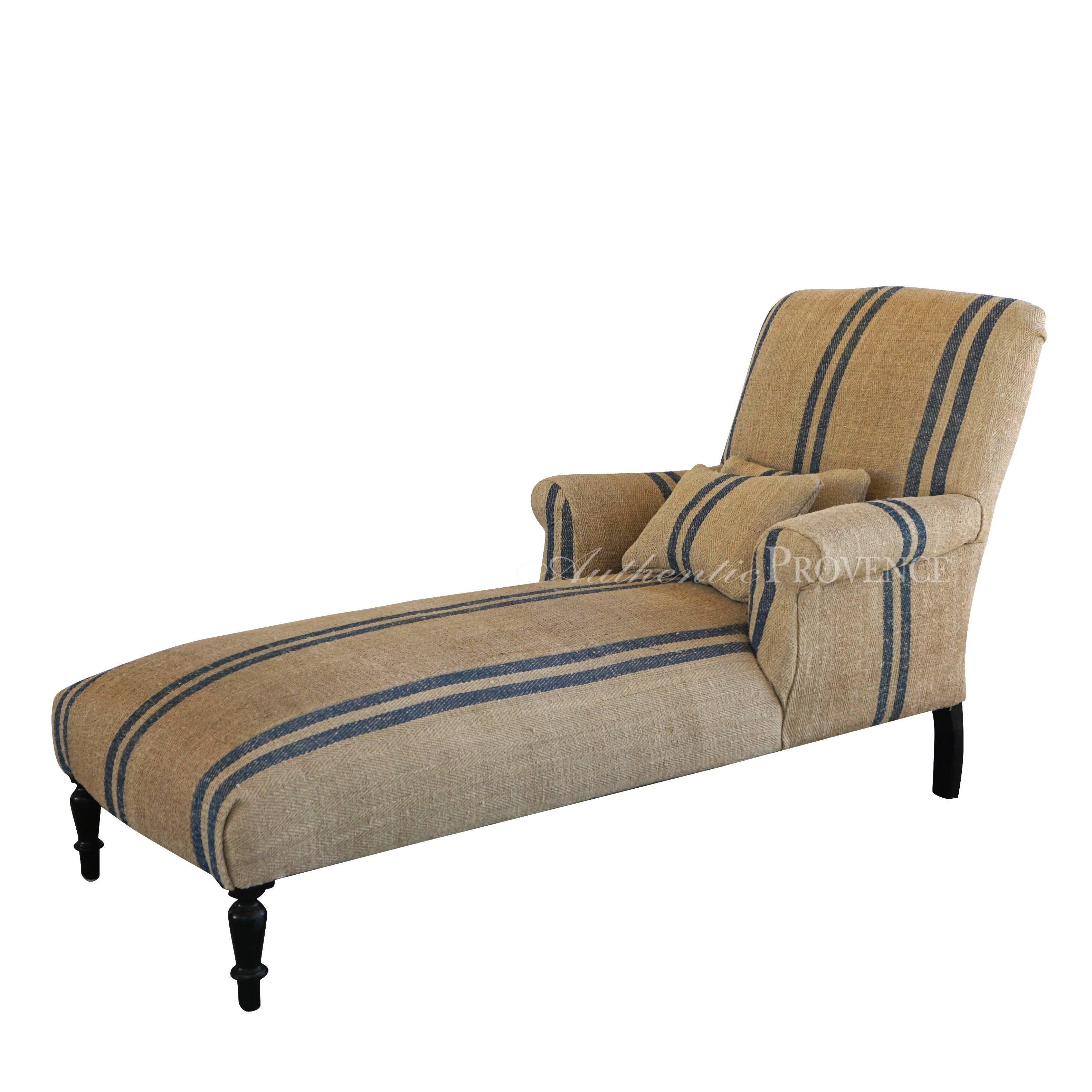 Mid-19th century, a Meridienne French sofa or chaise longue, Napoleon III period newly upholstered and recovered with antique double blue stripe hemp sack. and small rectangular pillow. Prov. France, circa 1860.