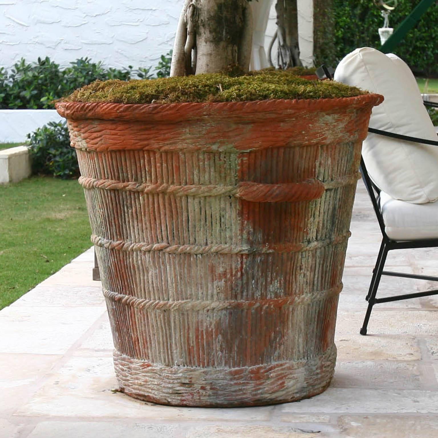 Very large, round garden jardinière from France with two lateral handles and beautifully handcrafted basket woven details in terra cotta. Lot of six planters available, but sold also singularly.