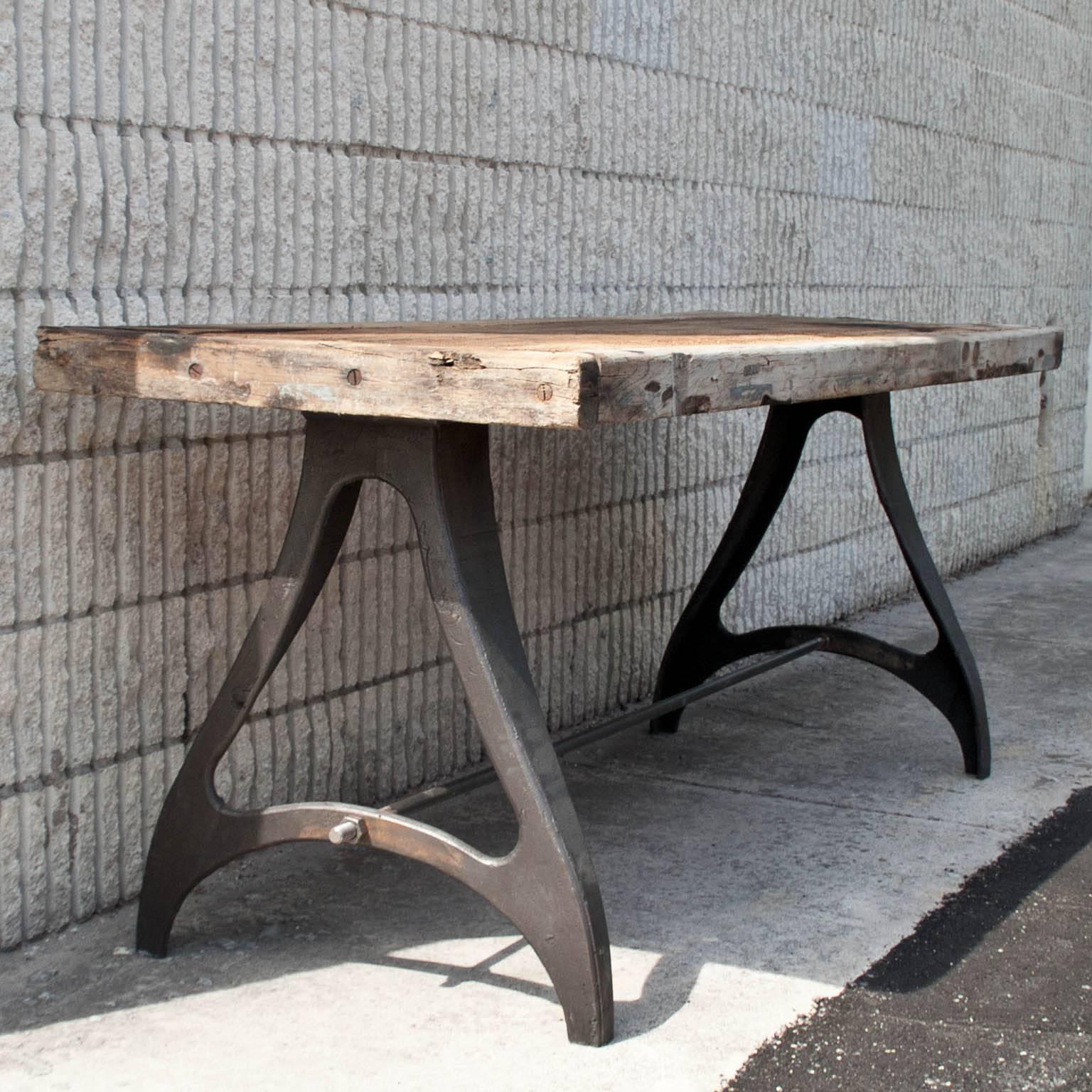 20th century Industrial Design from Paris, France, circa 1930.
Heavy cast iron base with French oak wooden top.
In Used-Aged-Clean condition.
 