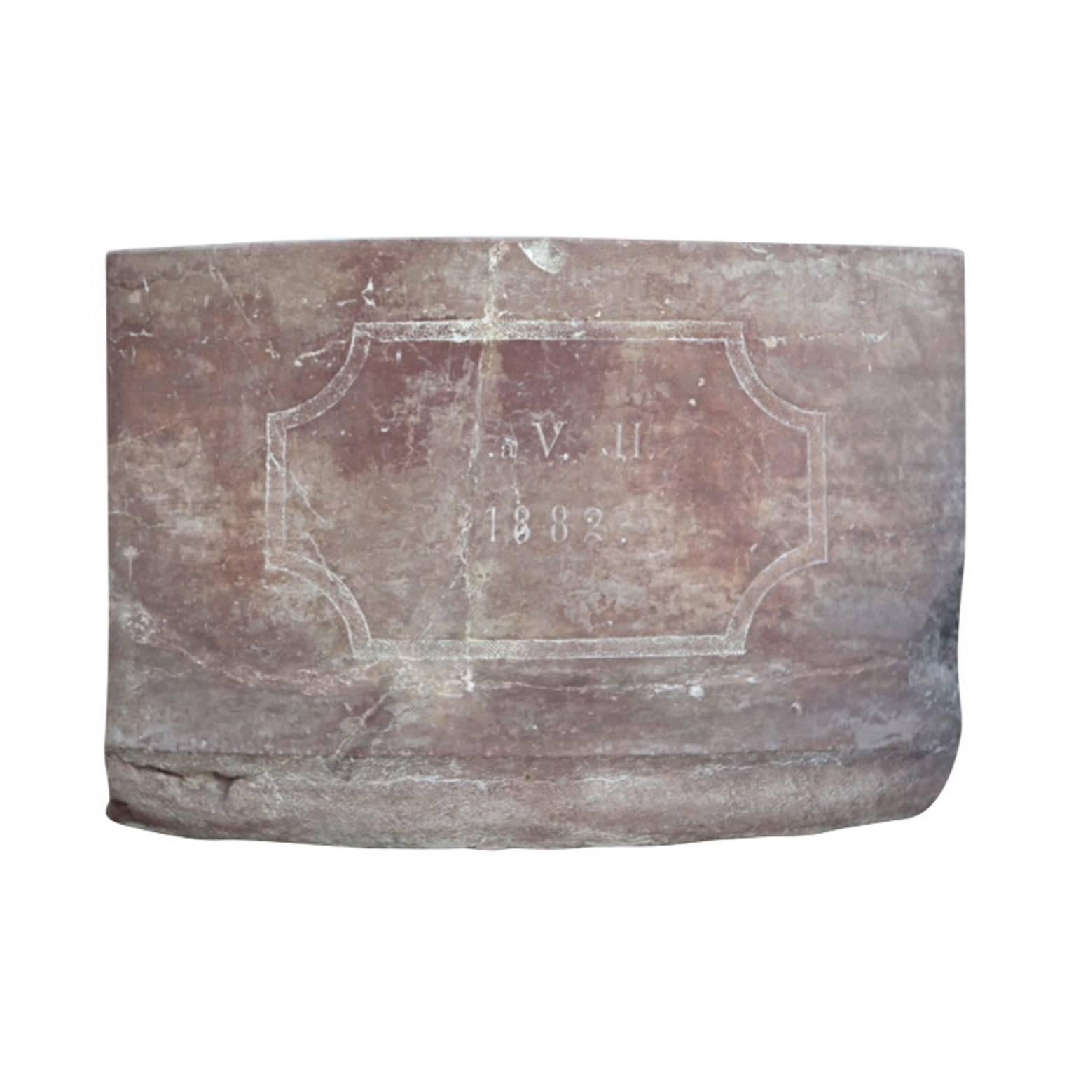 18th century hand-carved rectangular Baroque red Marble basin with a bowed front. Later inscription with the initials V.H.
1882 was carved on the front side, hand-carved red marble.