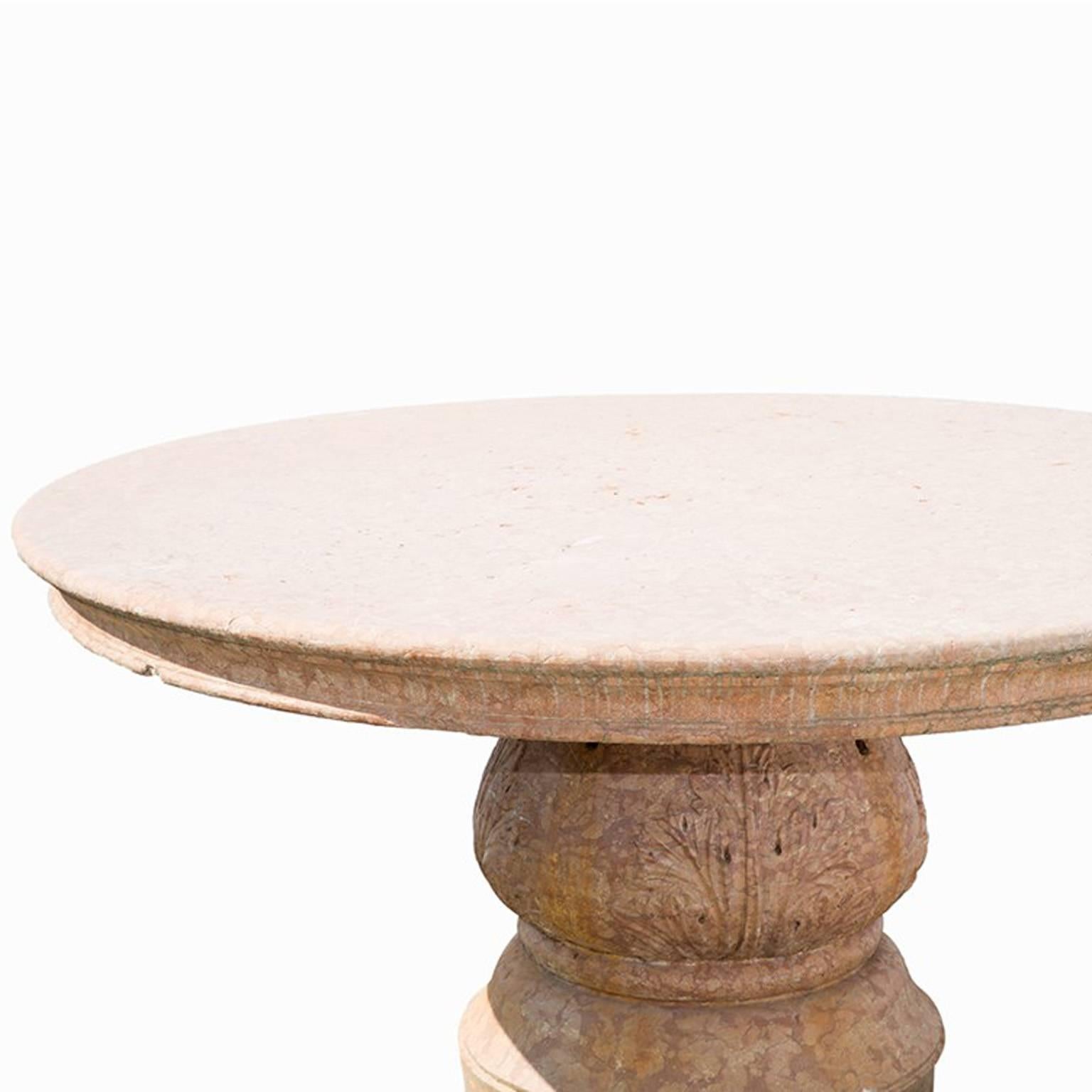 Heavy circular hand-carved Rosso Verona marble table with a baluster shaped base and delicate acanthus leaf carving and the heavy round marble-top,
Italy.