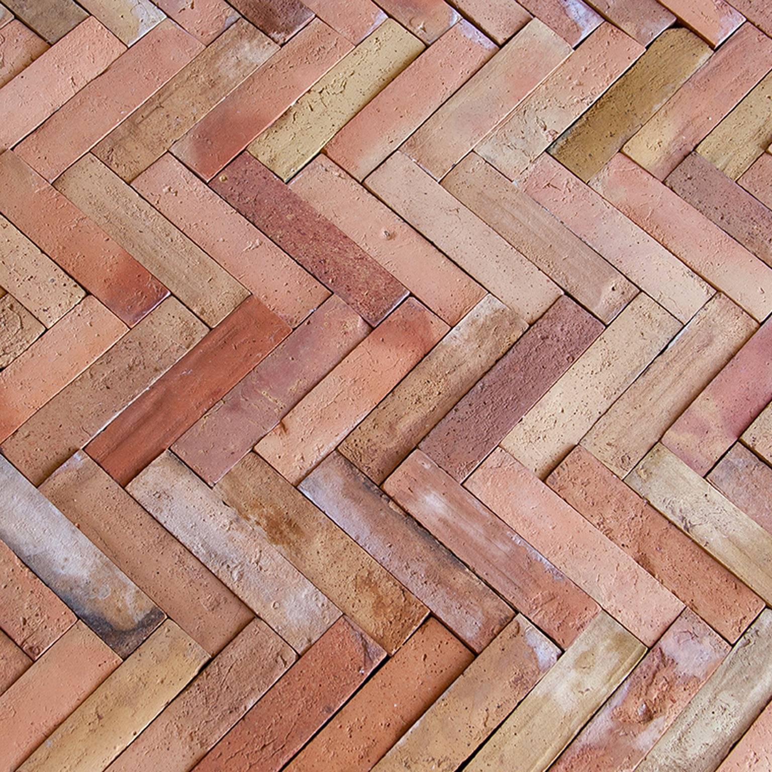 French reclaimed Terra Cotta bricks, over 100 years old. Each lot of these antique Terra Cotta tiles vary in size, color, and patina. Lot of 1000 sf at $23.00 sf in stock for immediate delivery.

