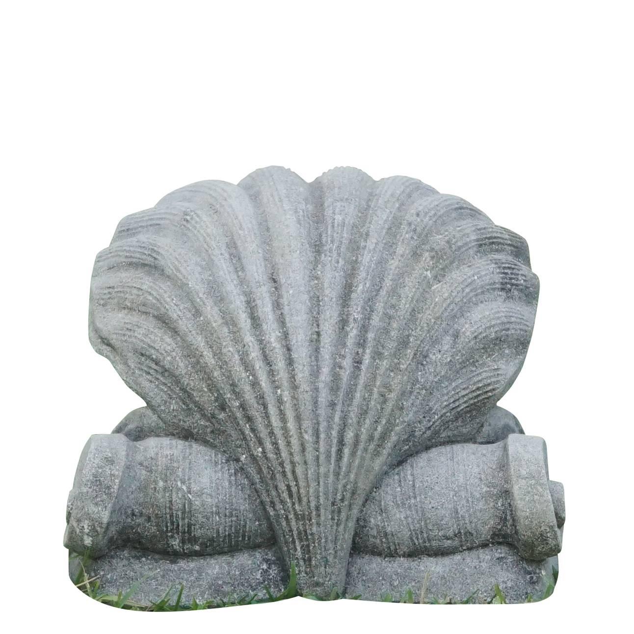 Over sized garden hand-carved fountain head in the shape of an oyster with a central pearl and heavy scrolls in the back. Could be used as a water feature or a garden ornament.