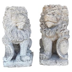 Pair of Hand-Carved Lion Garden Statues in Italian Limestone on a Pedastal