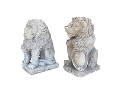 Pair of Hand-Carved Lion Garden Statues in Italian Limestone on a Pedastal