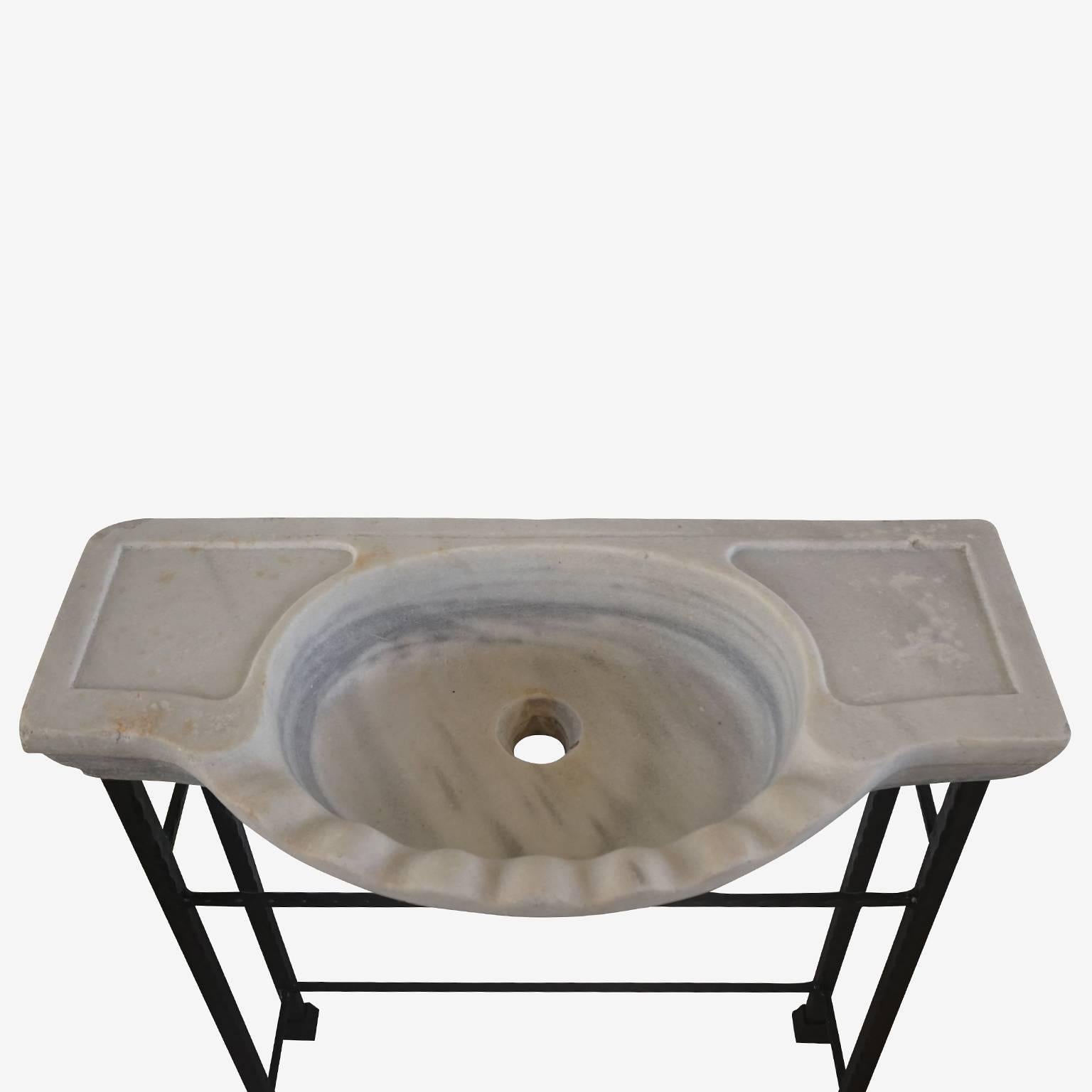 scalloped marble sink