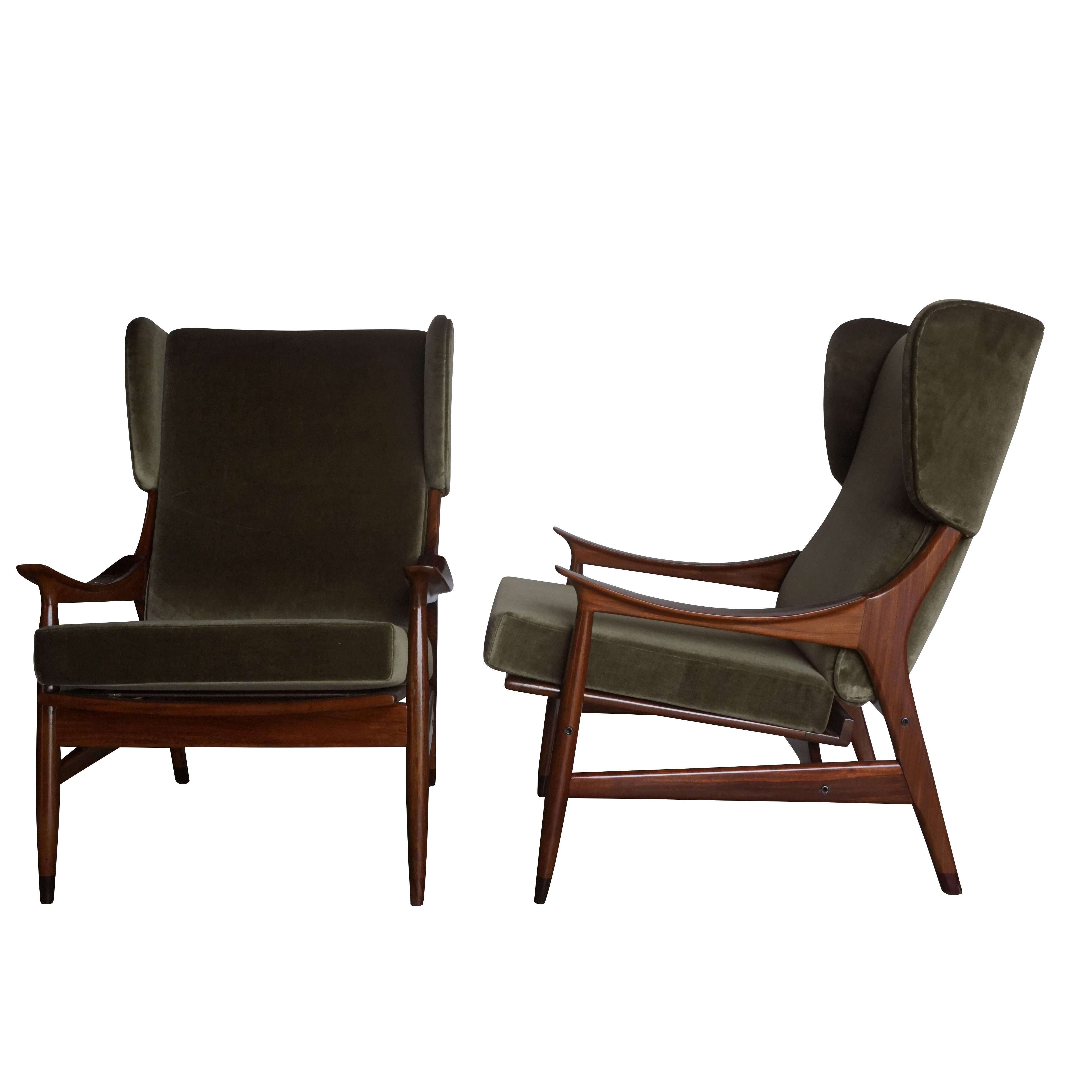 Mid-Century Modern, a pair of Danish teak wingback chairs made of rosewood and green velvet upholstery, 17.5 inch seat height, Scandinavia.