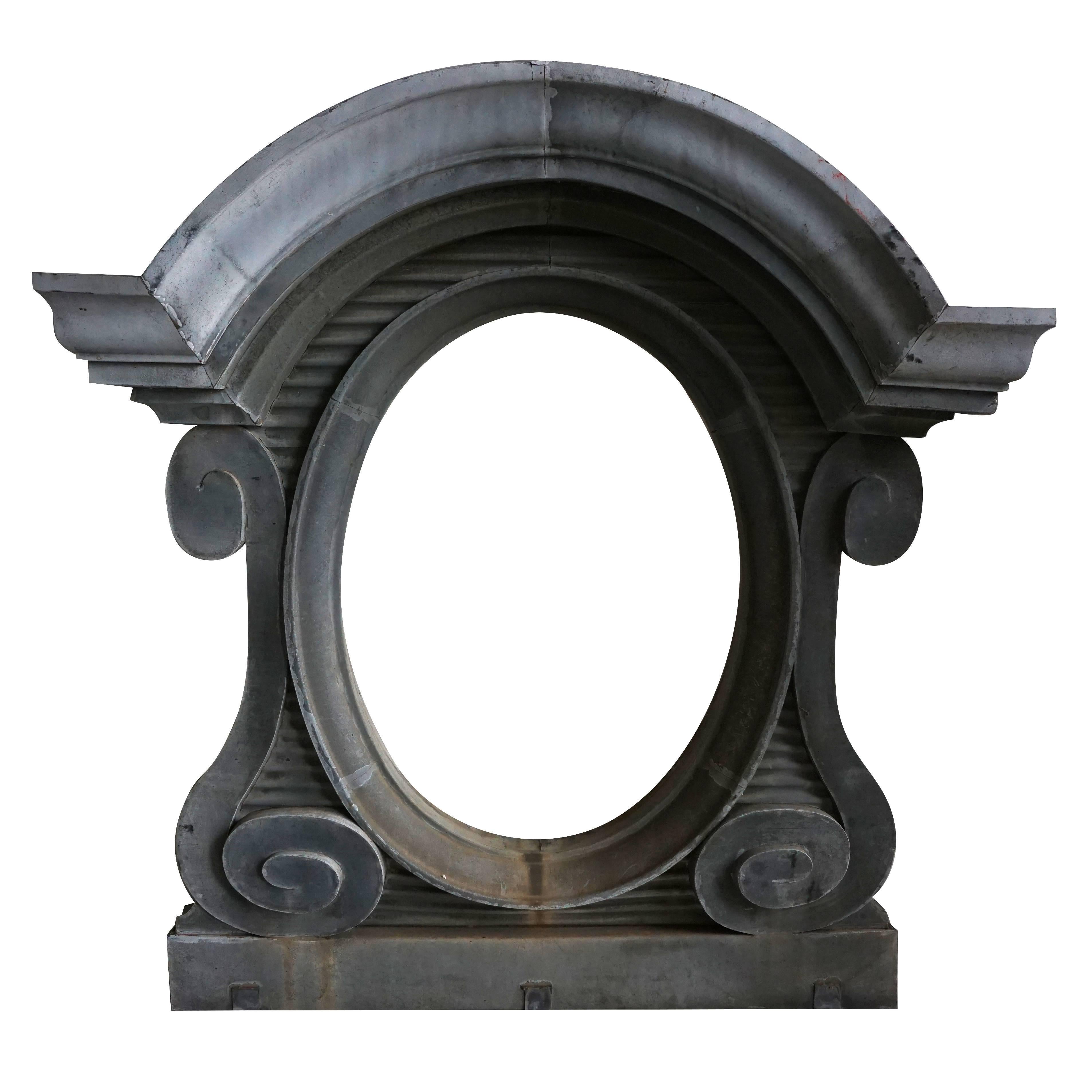 Late 19th century, a set of three French zinc window surrounds with recently added antiqued mirror glass from a Palais in Nantes, France, circa 1880 Nantes, France.