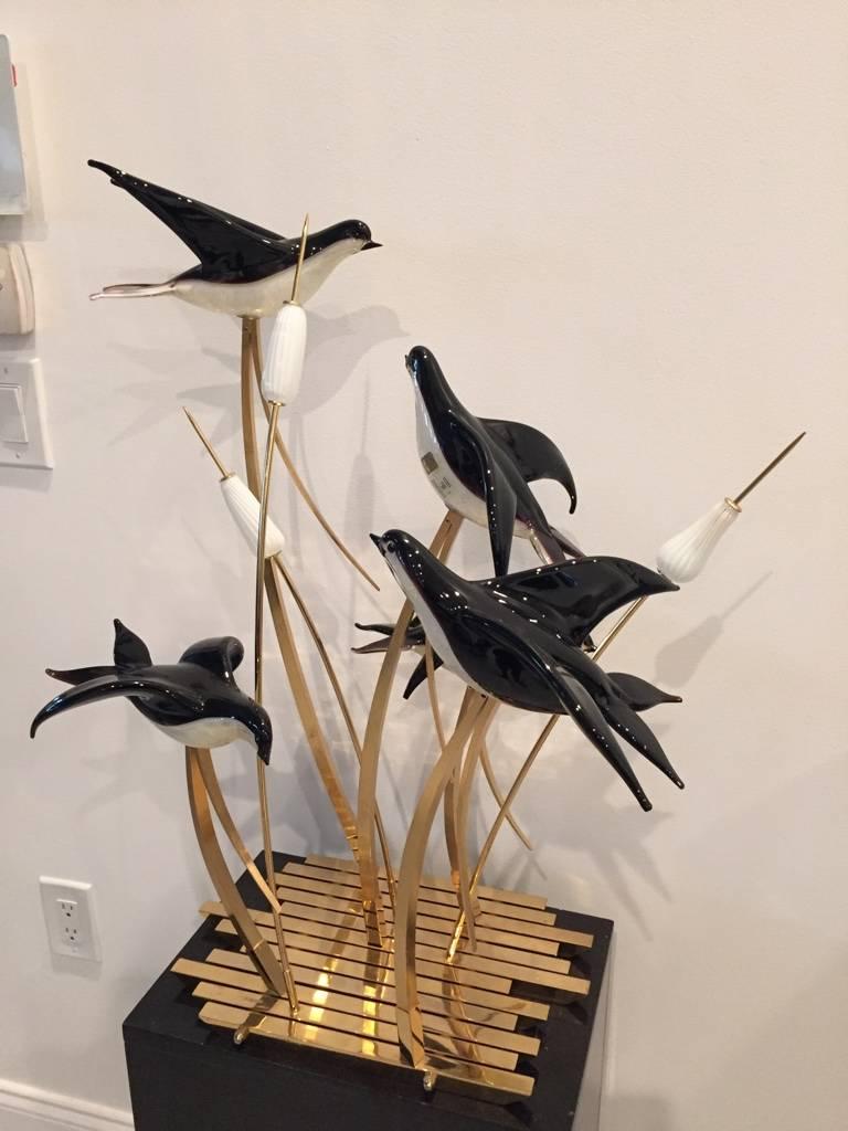 Stunning Licio Zanetti Murano Italian Vetri art glass birds sculpture. Having brass frame and handblown Murano birds. Five birds and three white glass flowers.
   