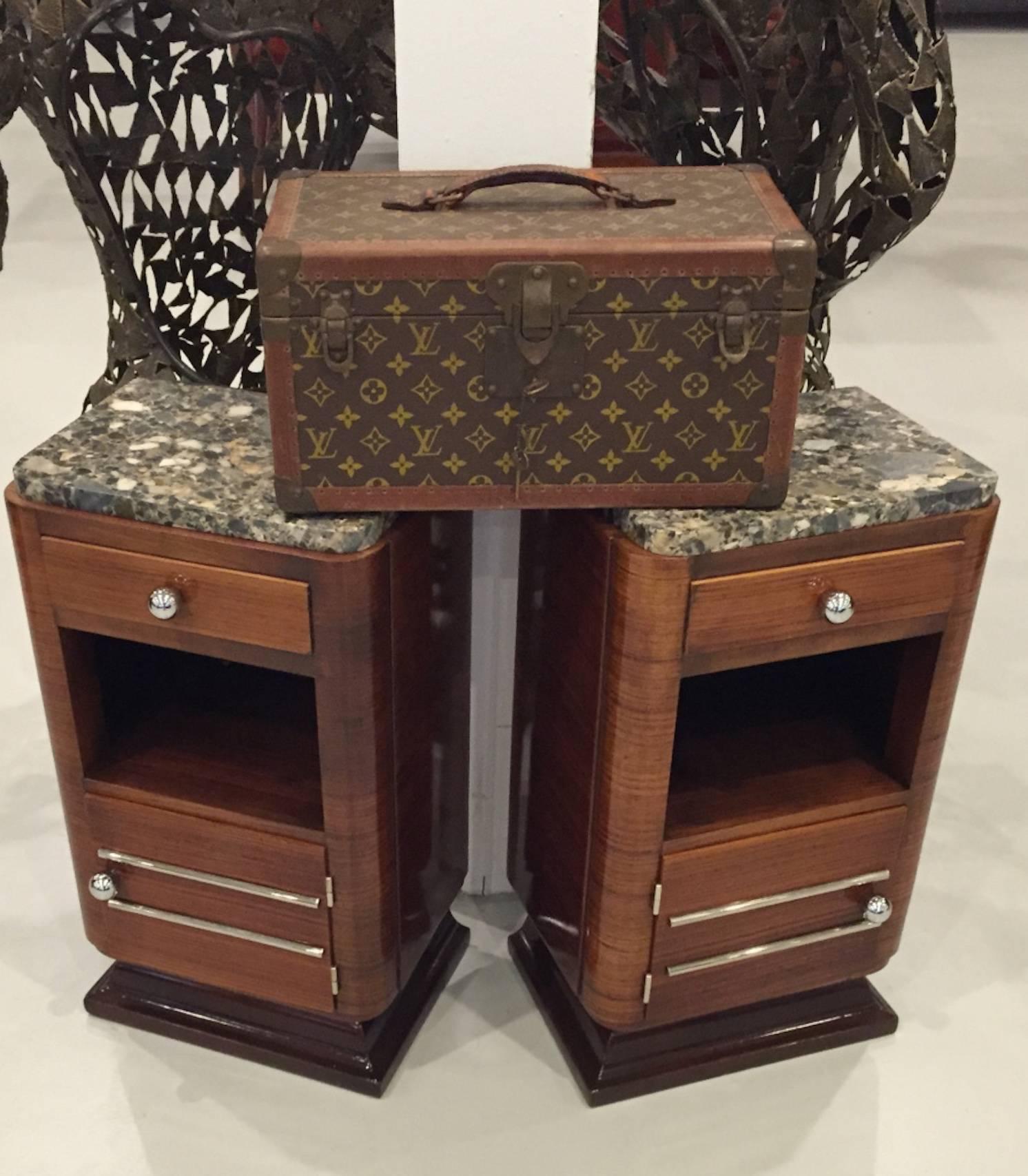 Pair of French Art Deco nightstands with marble tops. Stunning polished nickel hardware that accents that wood beautifully. Beautiful deco details. Side tables.