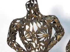 Pair of Brutalist Metal Torso Sculptures