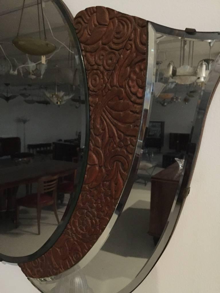 This stunning American Art Deco 1920s mirror with wood floral motif is perfect for any room in your home. Very elegant and beautiful. 