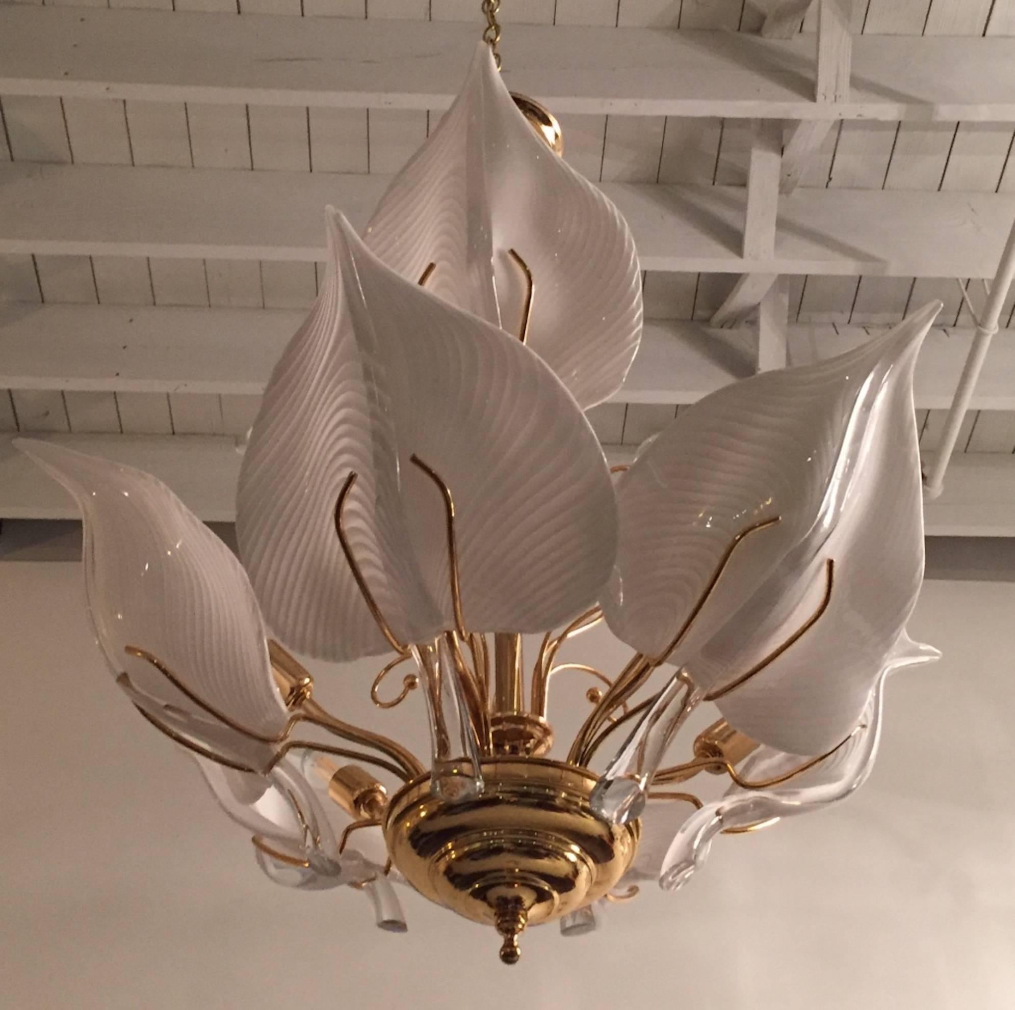 Stunning Italian Mid-Century Modern hand blown two tired Murano glass calla lilies chandelier. With beautiful brass fixture. Any amount of chain can be added for custom hanging length. 
