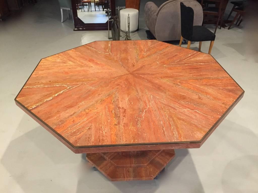 A very unique Italian Mid Century Modern gorgeous octagonal dining table on top of an eight sided base. it can also be used for a gueridon,  grand pedestal, or in the middle of an entrance hall. 