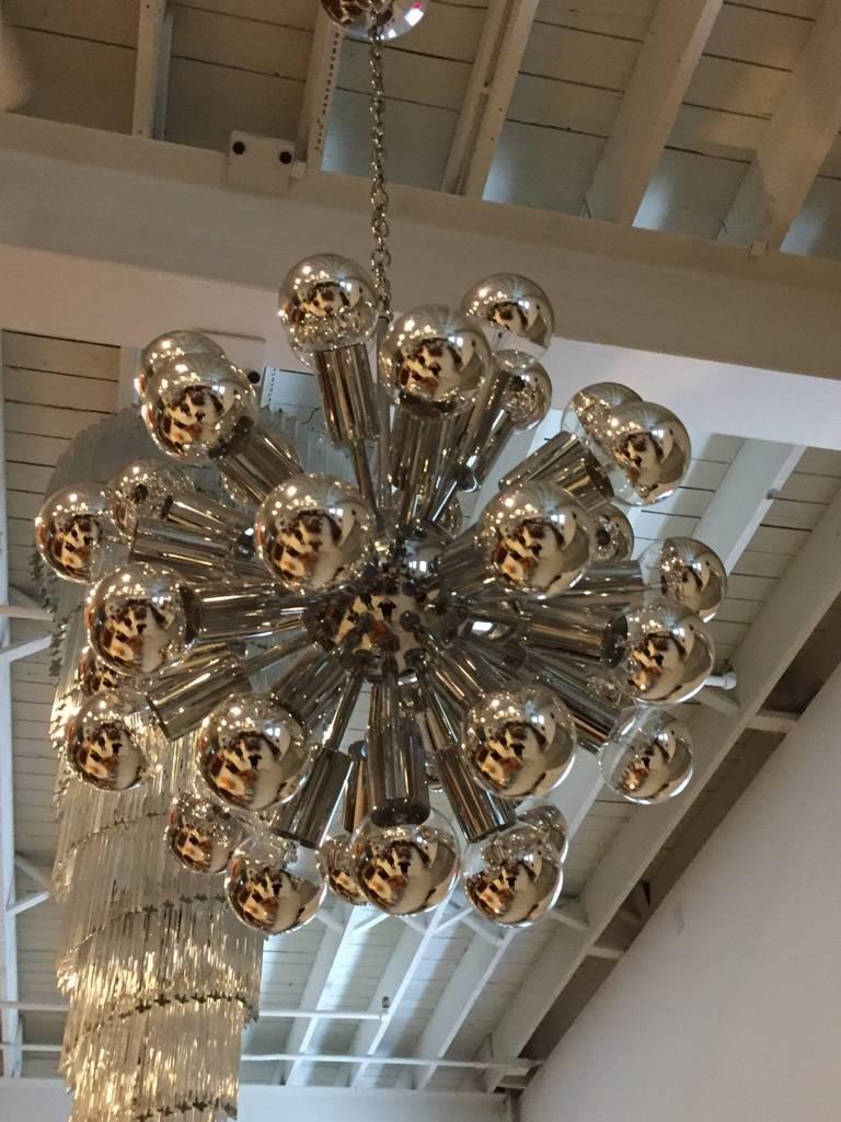 Stunning Mid-Century Modern chrome Sputnik chandelier with 36 silver tipped bulbs. 

Height without chain 27 inches.