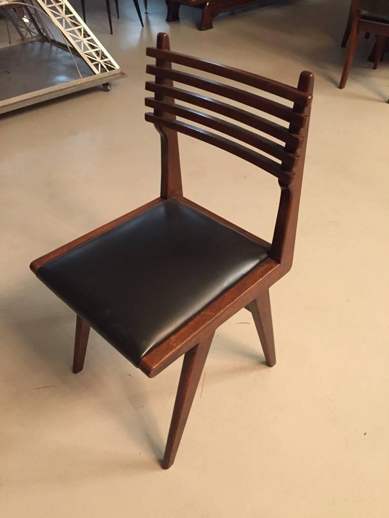 Set of six Italian Mid-Century Modern dining chairs. Have not been refinished, in original condition.